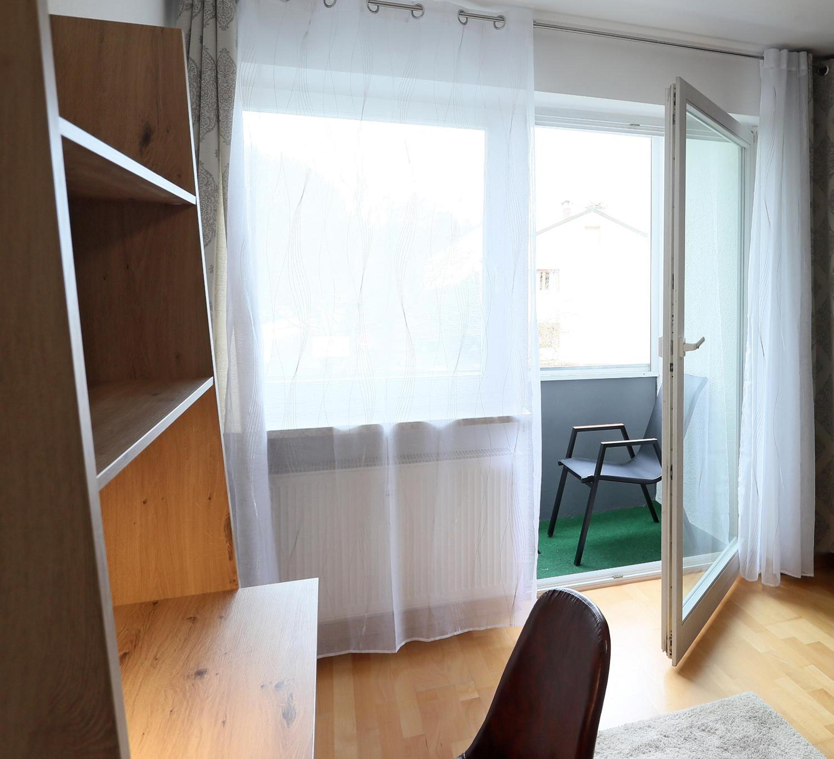 Three-Bedroom Apartment photo 2