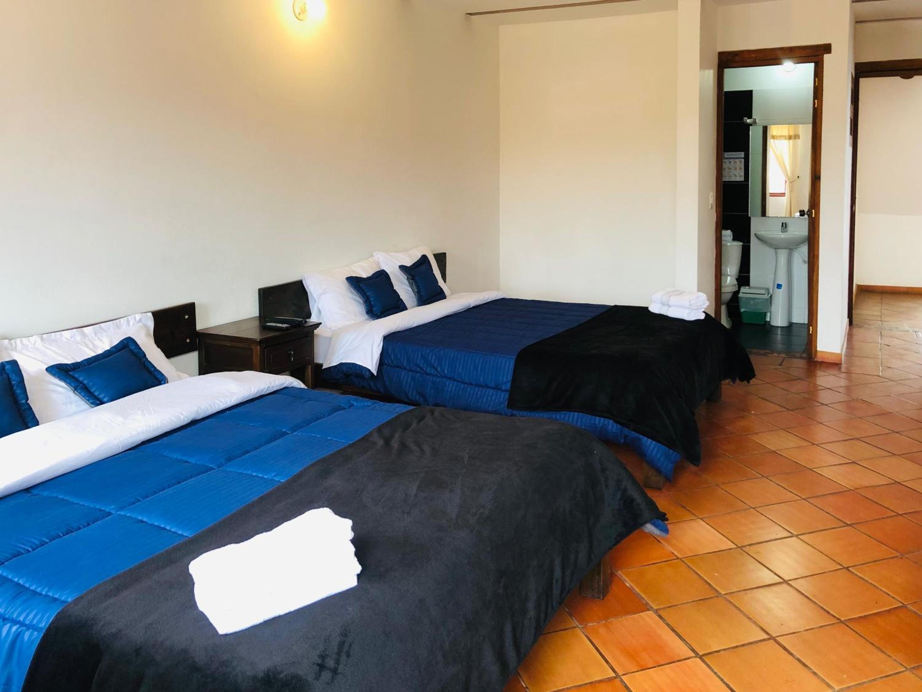 Quadruple Room with Balcony photo 2