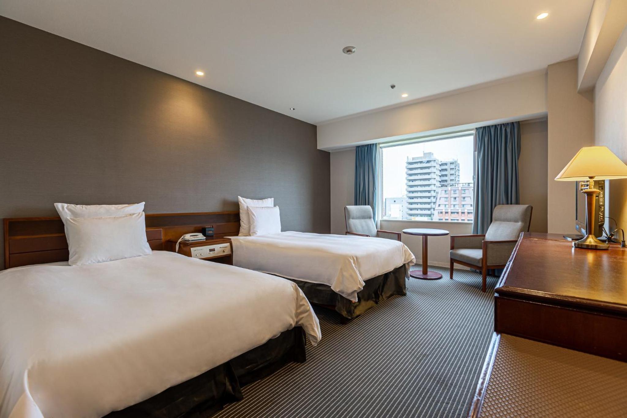 Premium Twin Room - Photo 8