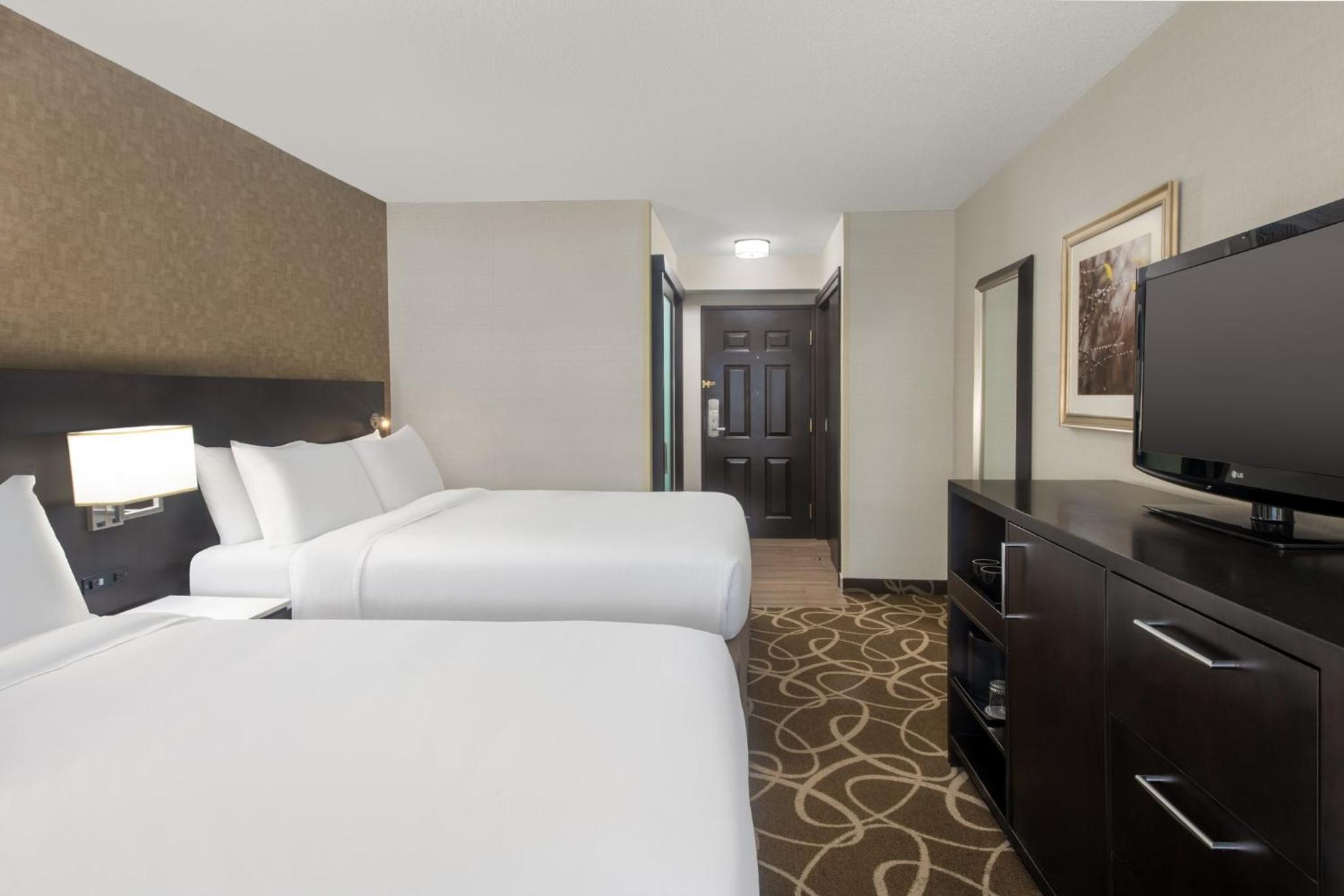 Standard Queen Room with Two Queen Beds - Photo 1