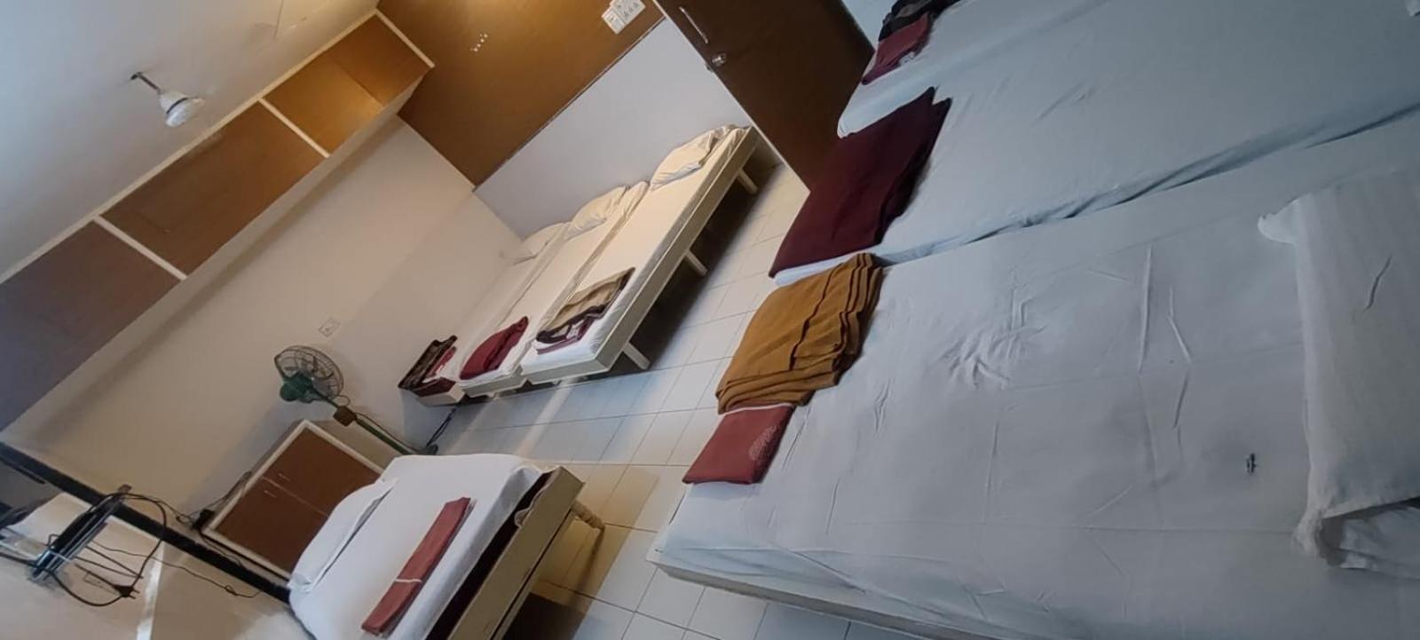 Single Bed In Dormitory Room