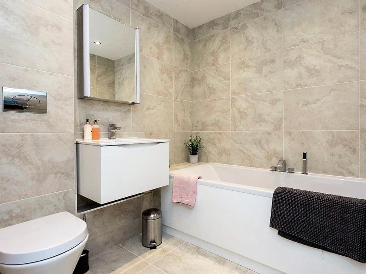 Three-Bedroom Apartment - Photo 11