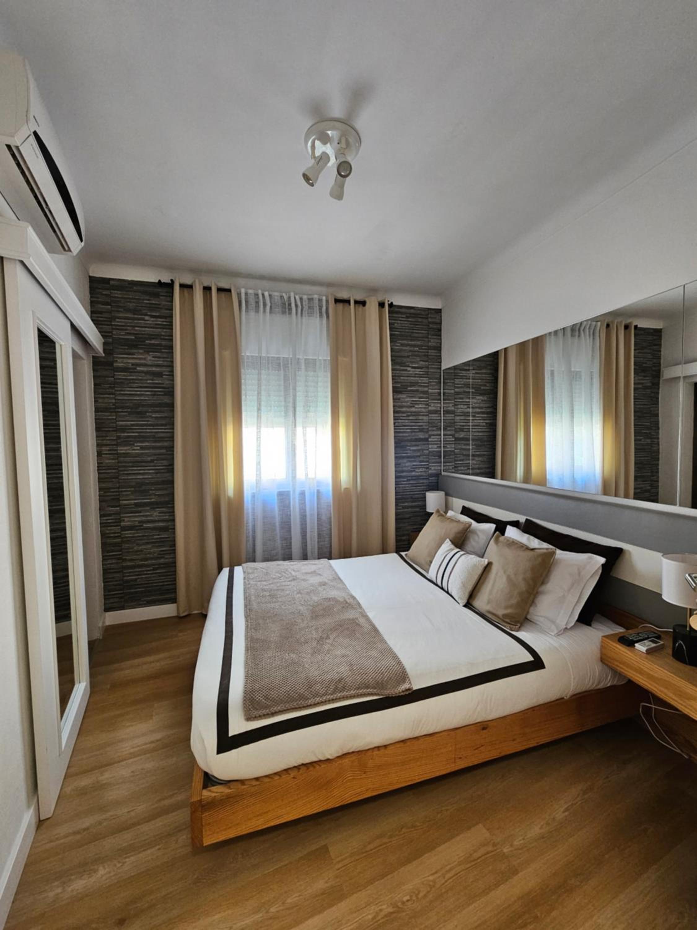 Three-Bedroom House - Photo 27
