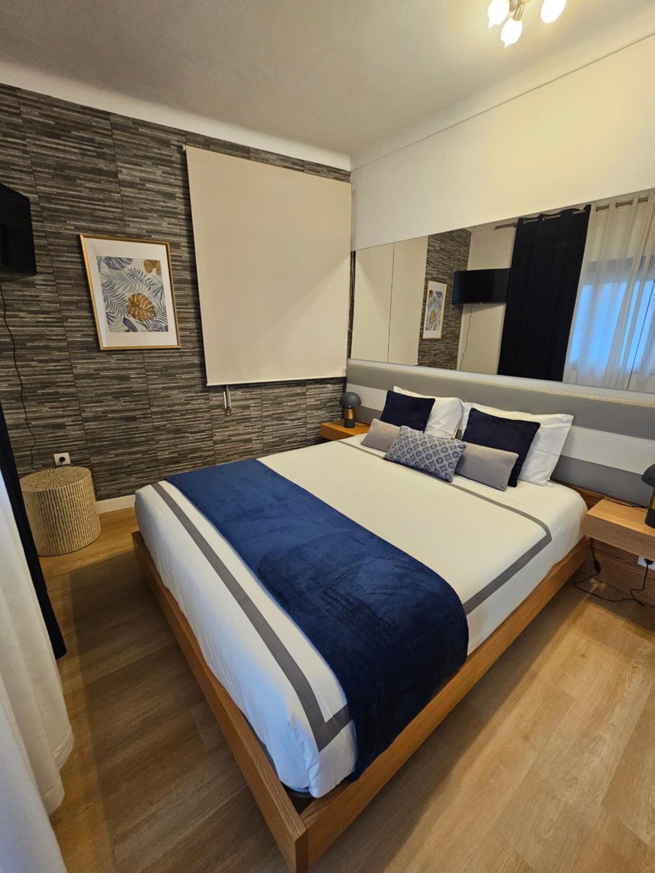 Three-Bedroom House - Photo 25