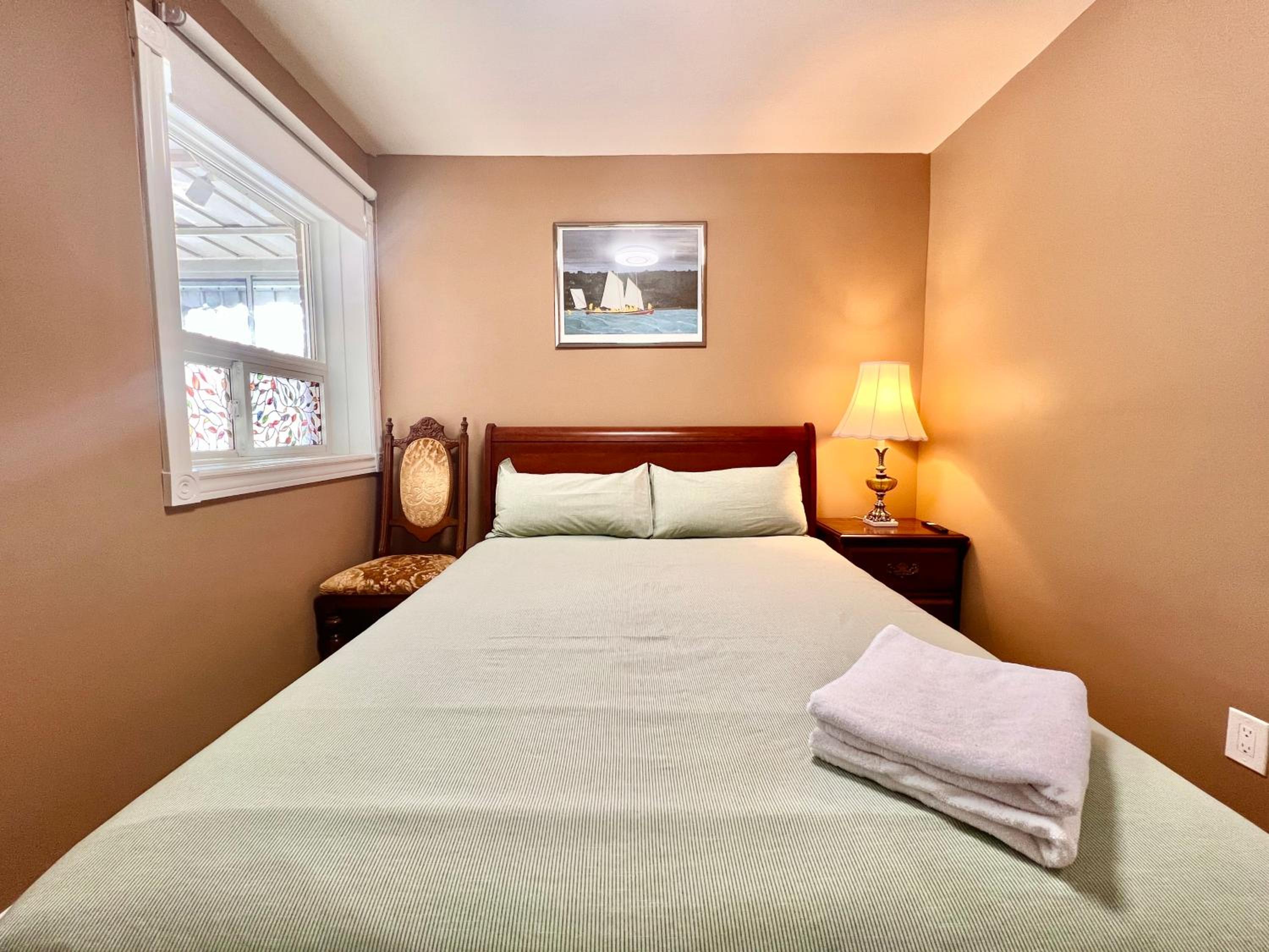 Queen Room with Shared Bathroom