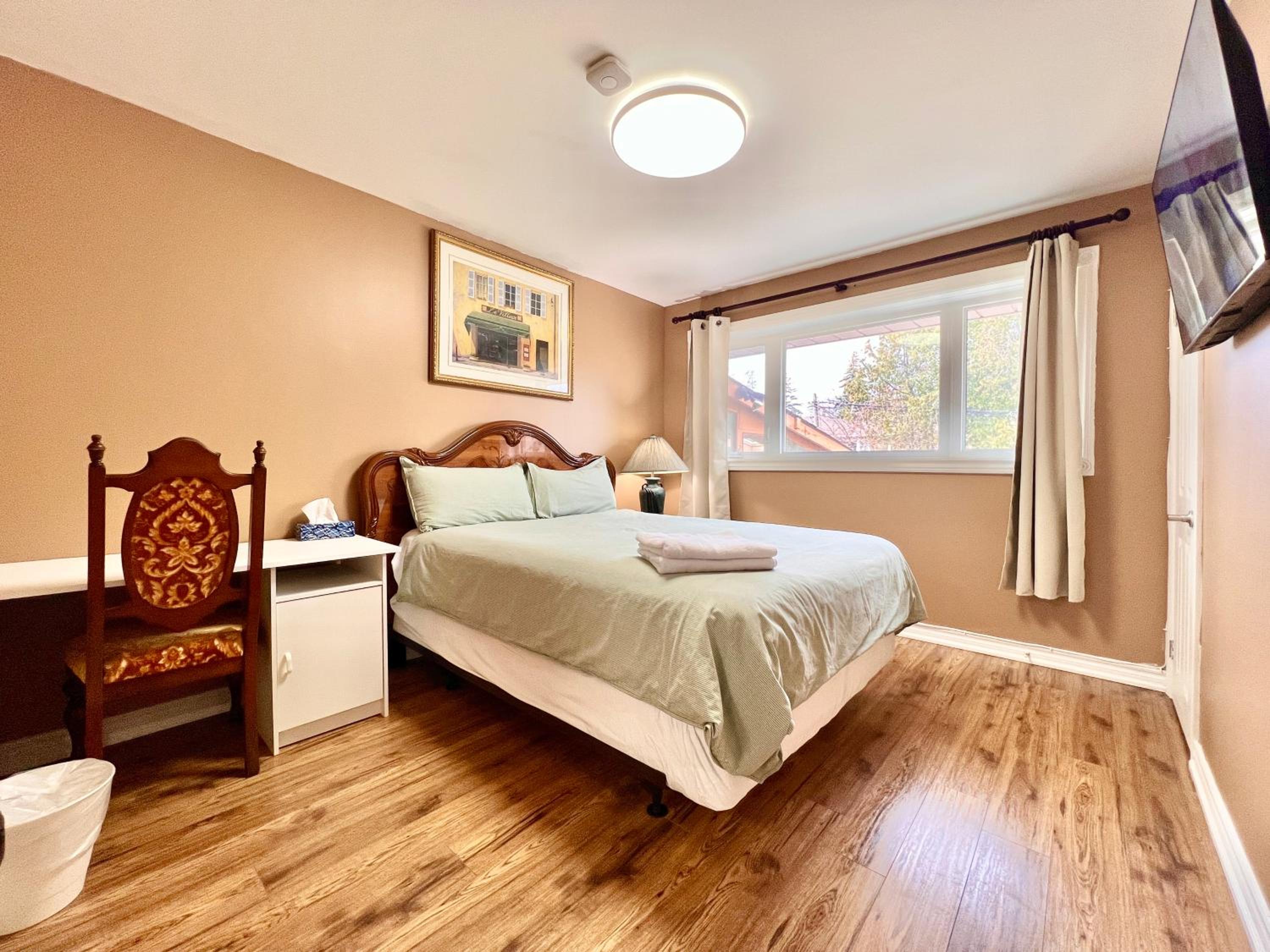 Queen Room with Shared Bathroom