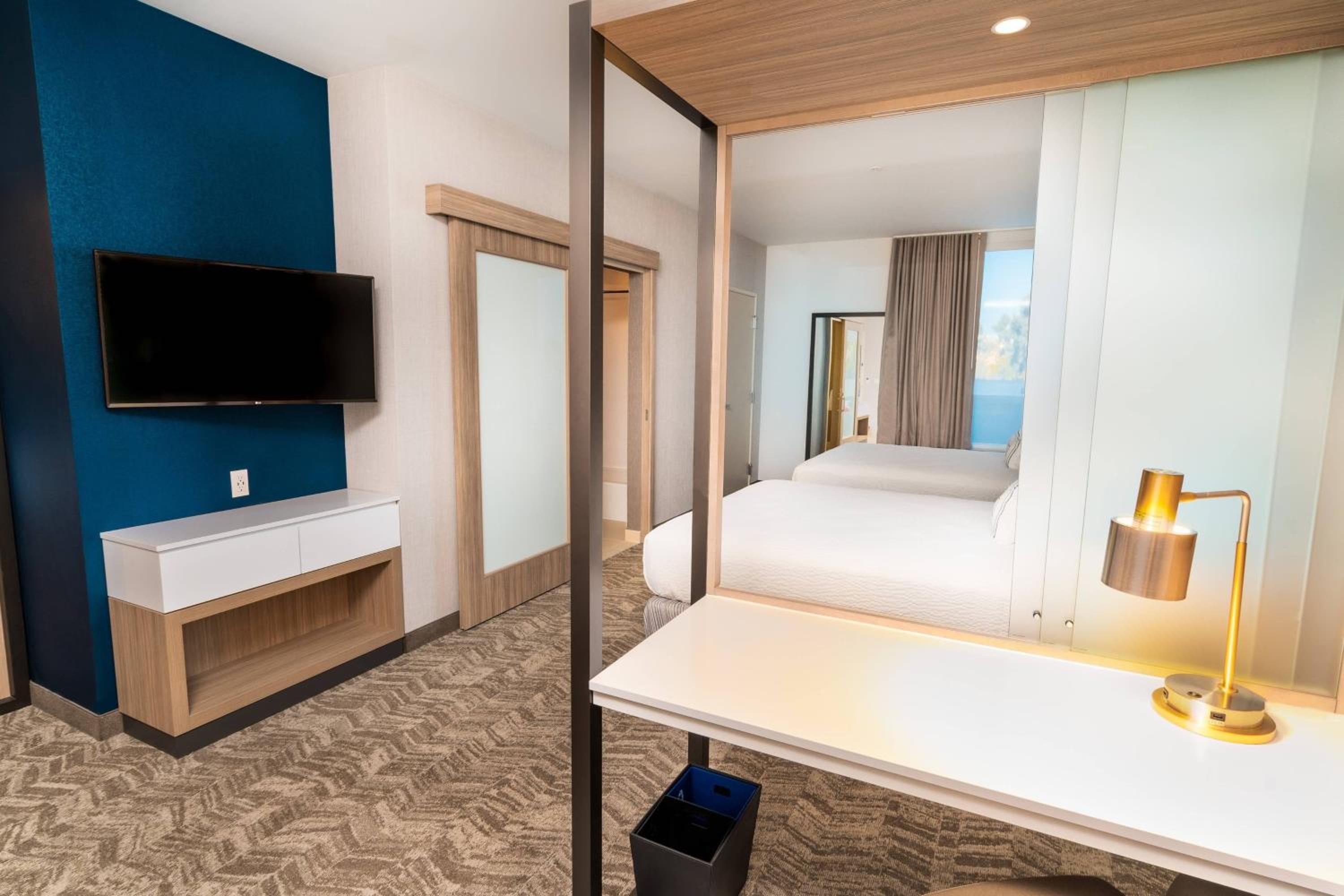 Queen Suite with Two Queen Beds and Trundle Sofa - Photo 1