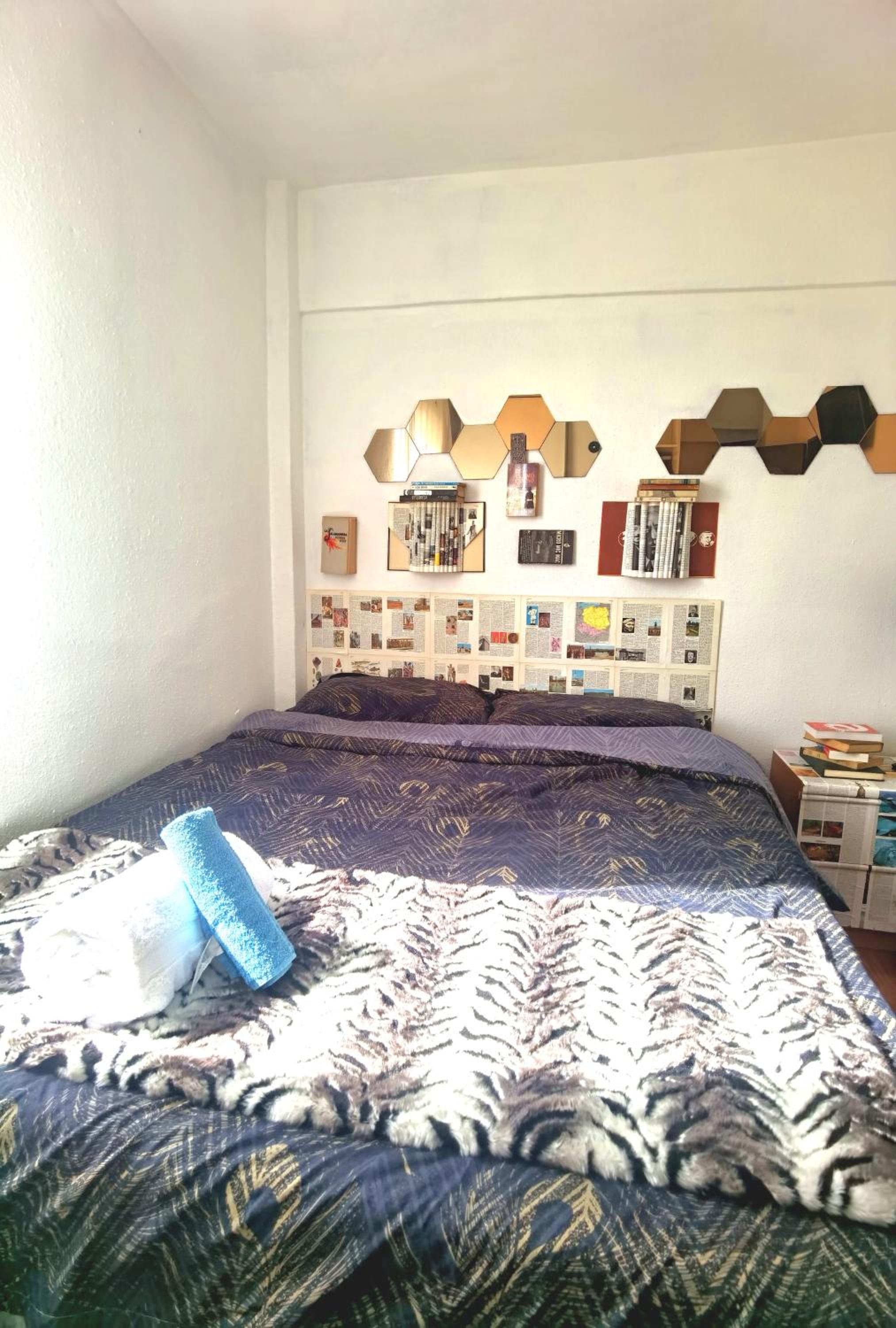 Habitación individual con baño compartido