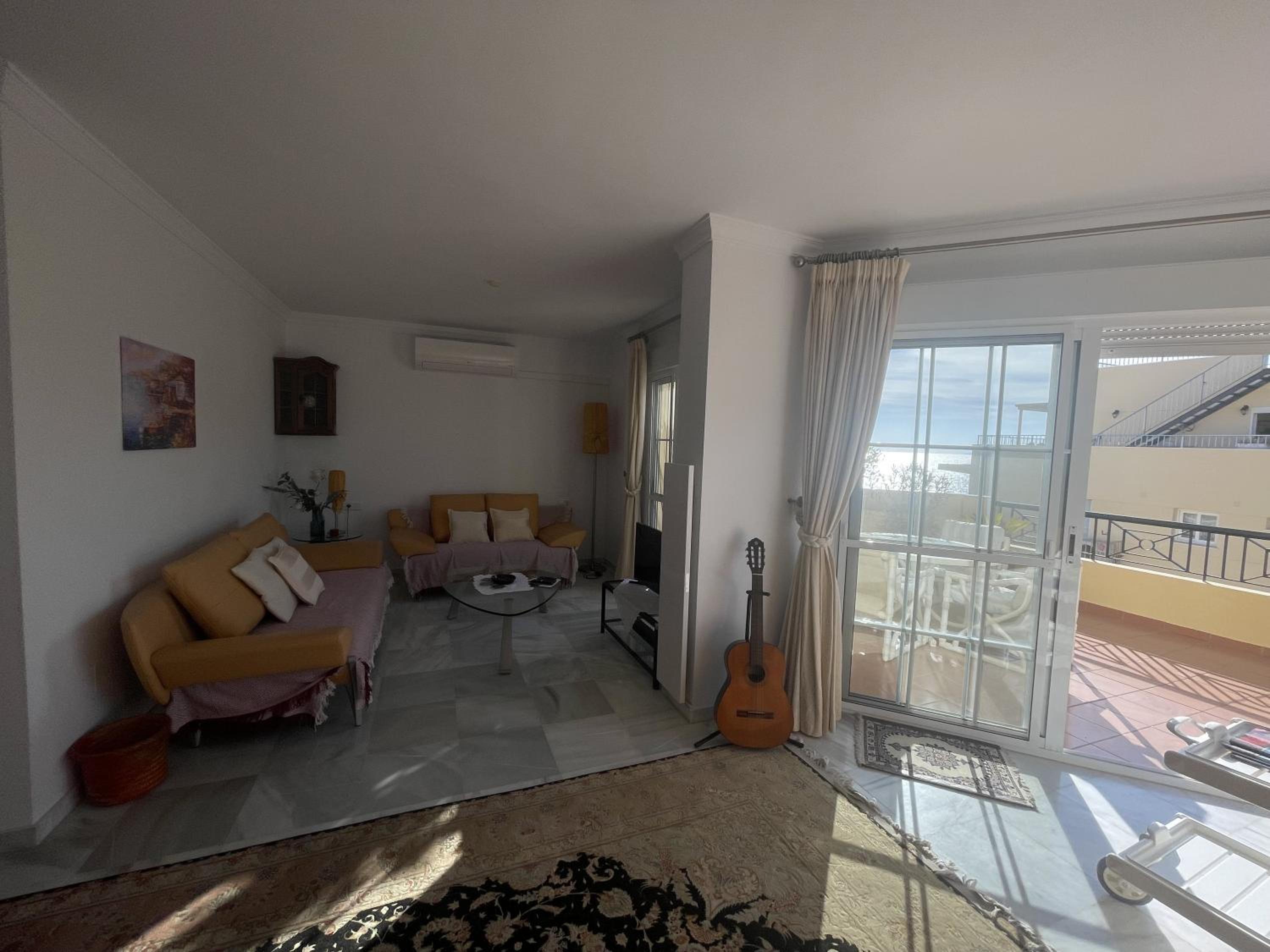Apartamento de un dormitorio superior con balcón