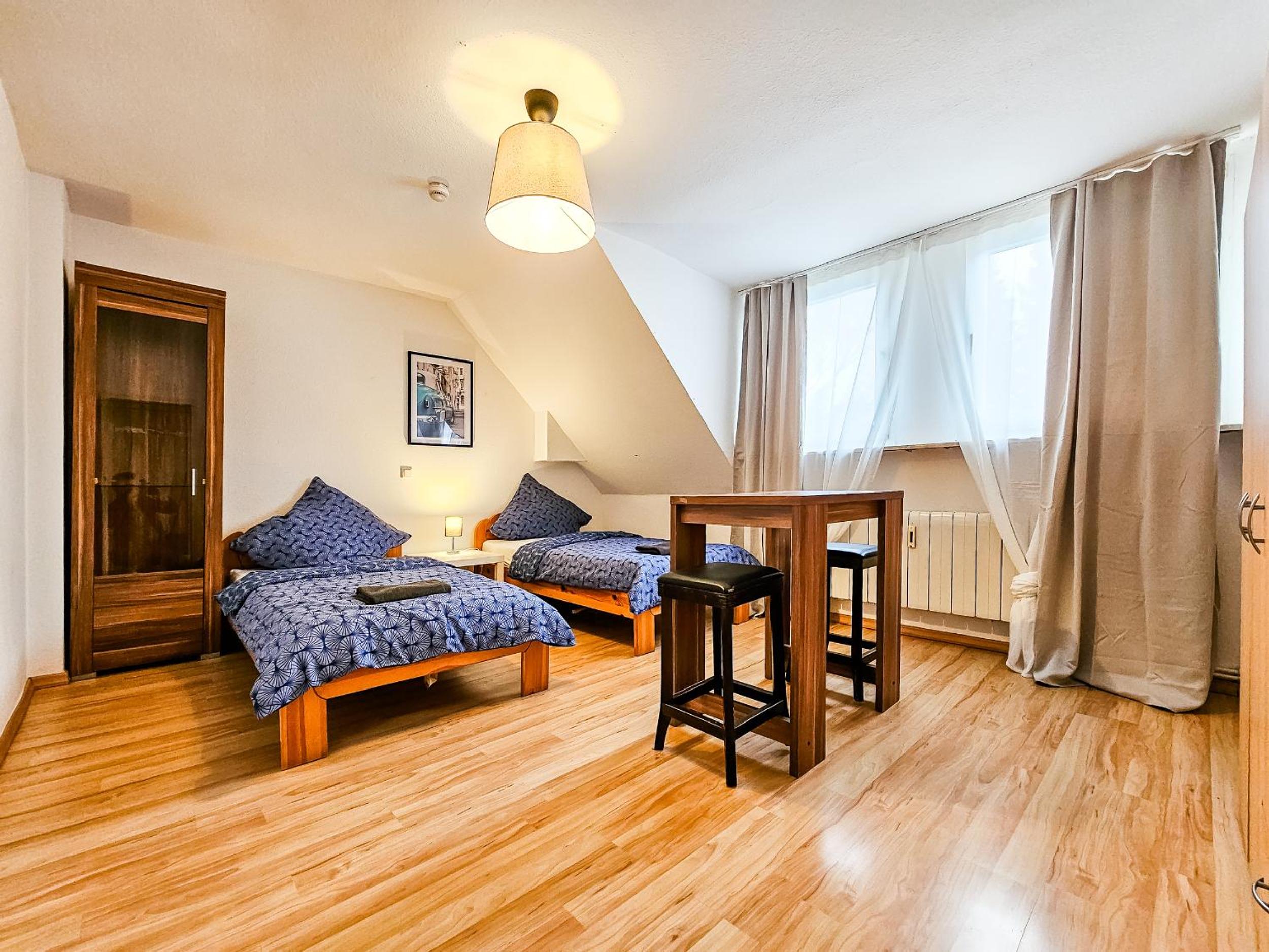 Four-Bedroom Apartment with Balcony  photo 1