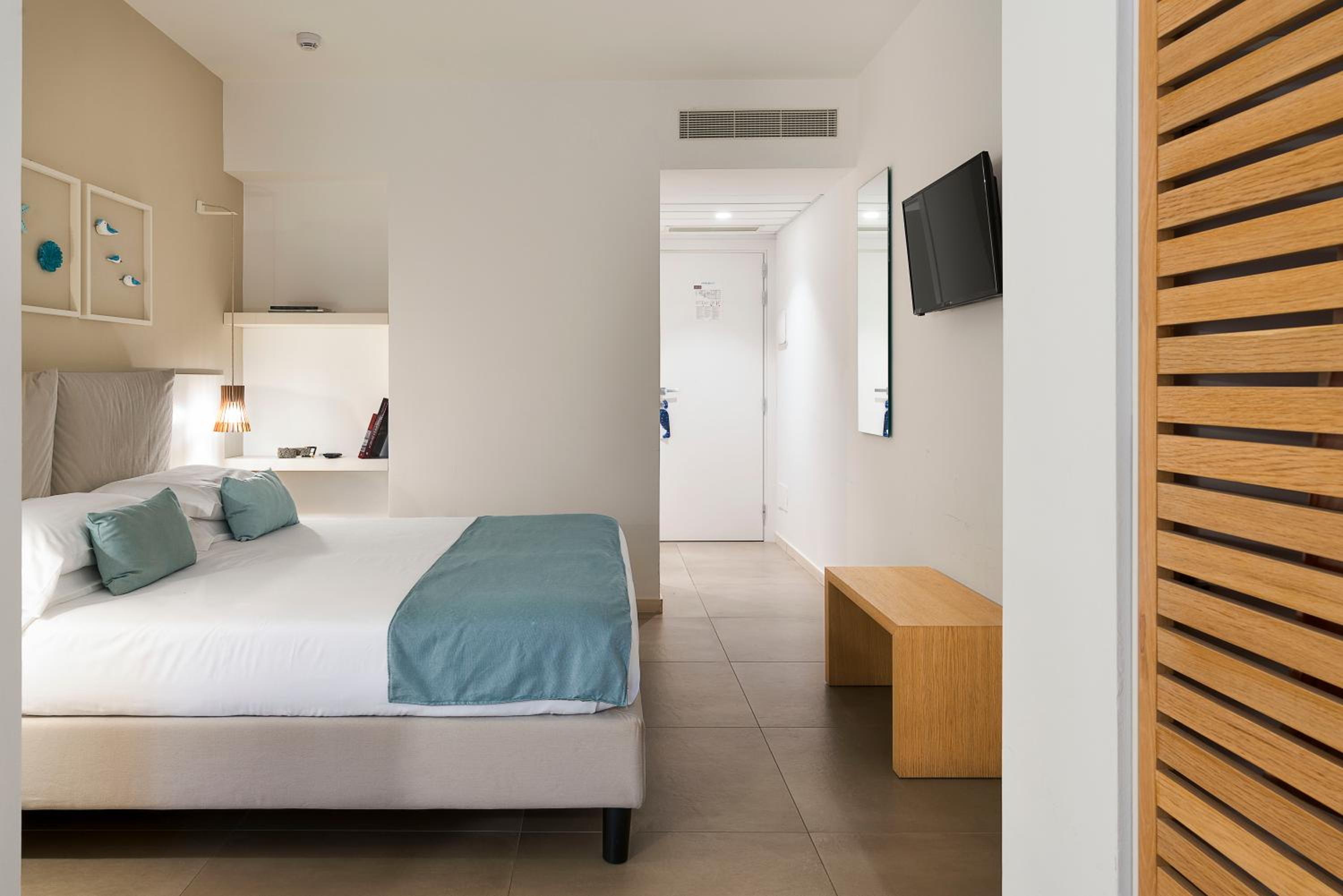 Superior Triple Room with Side Sea View