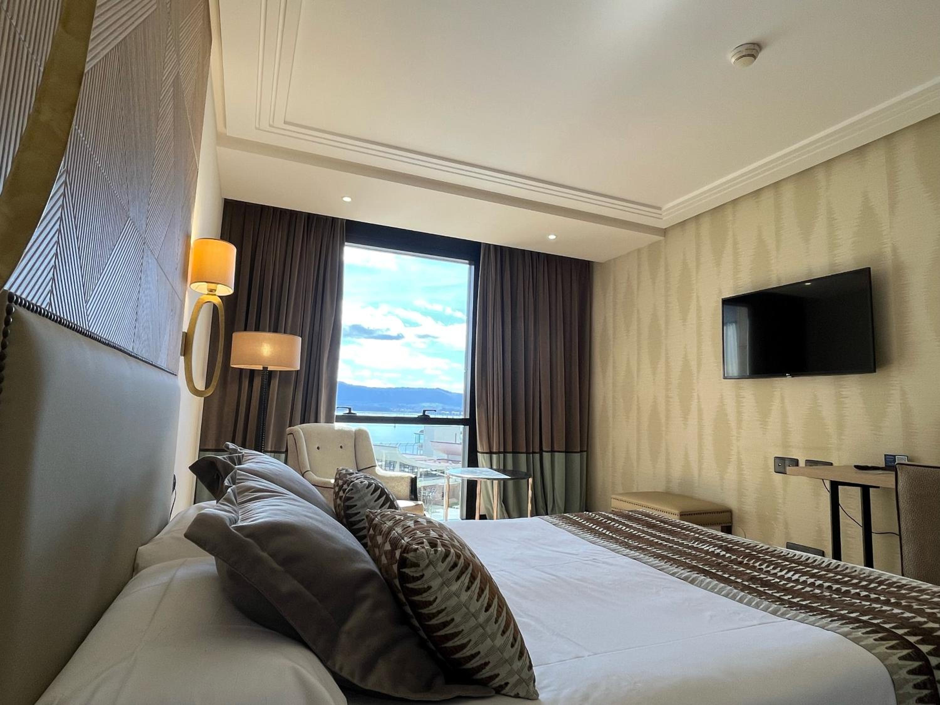 Habitación Queen con vista al mar (2 adultos + 1 niño)