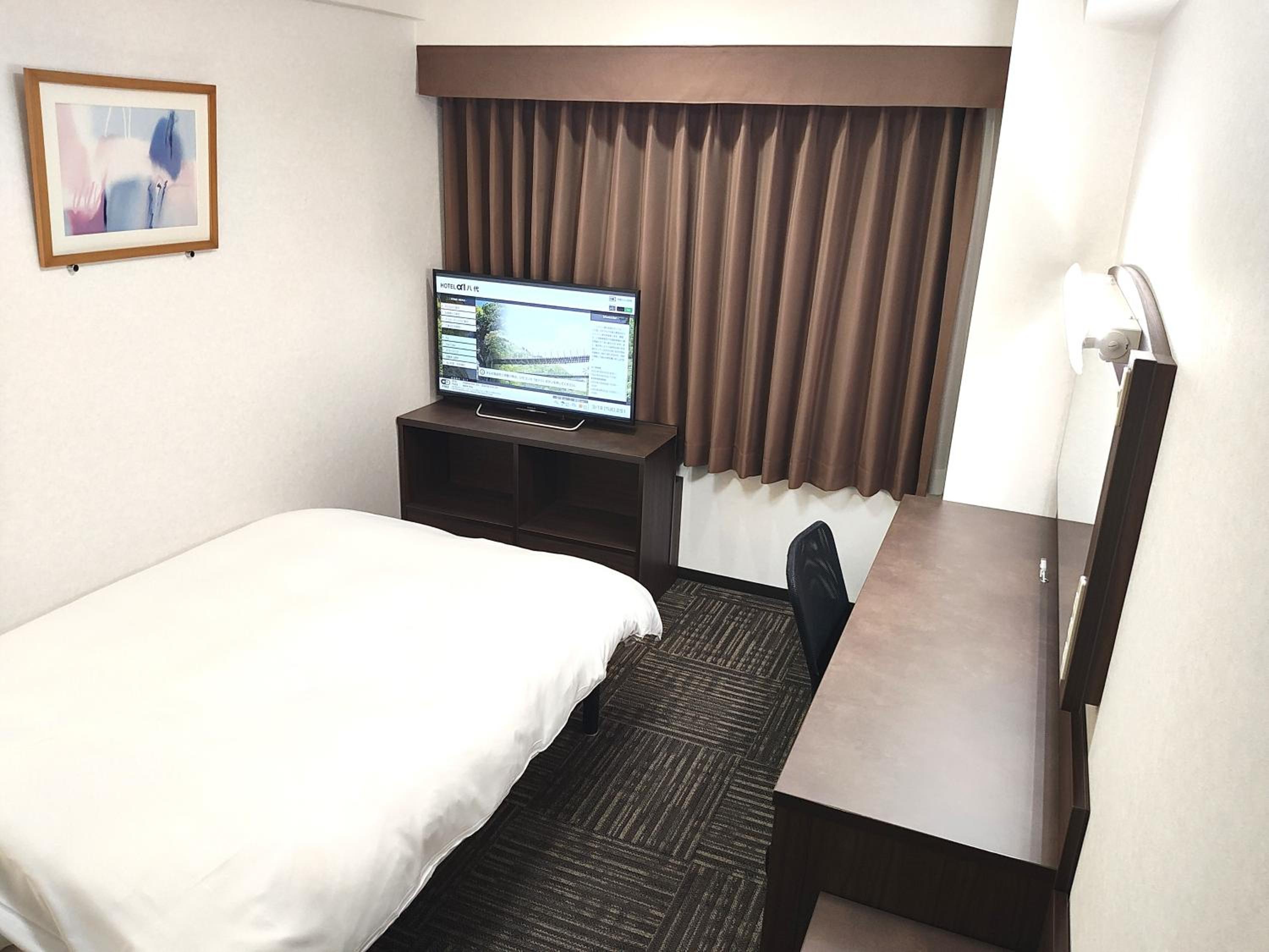 Deluxe Single Room - Smoking photo 1