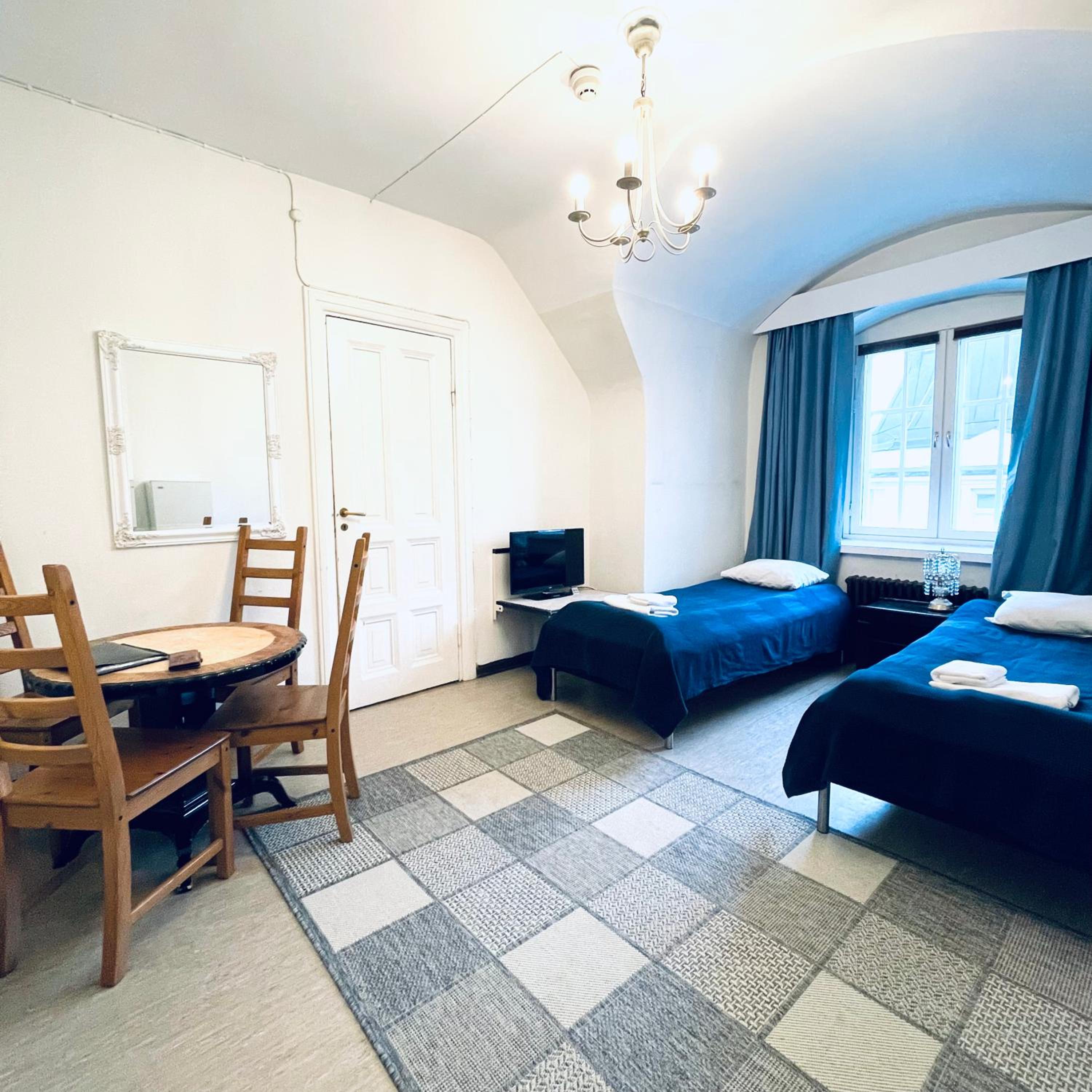 Family Room with City View - Shared Bathroom