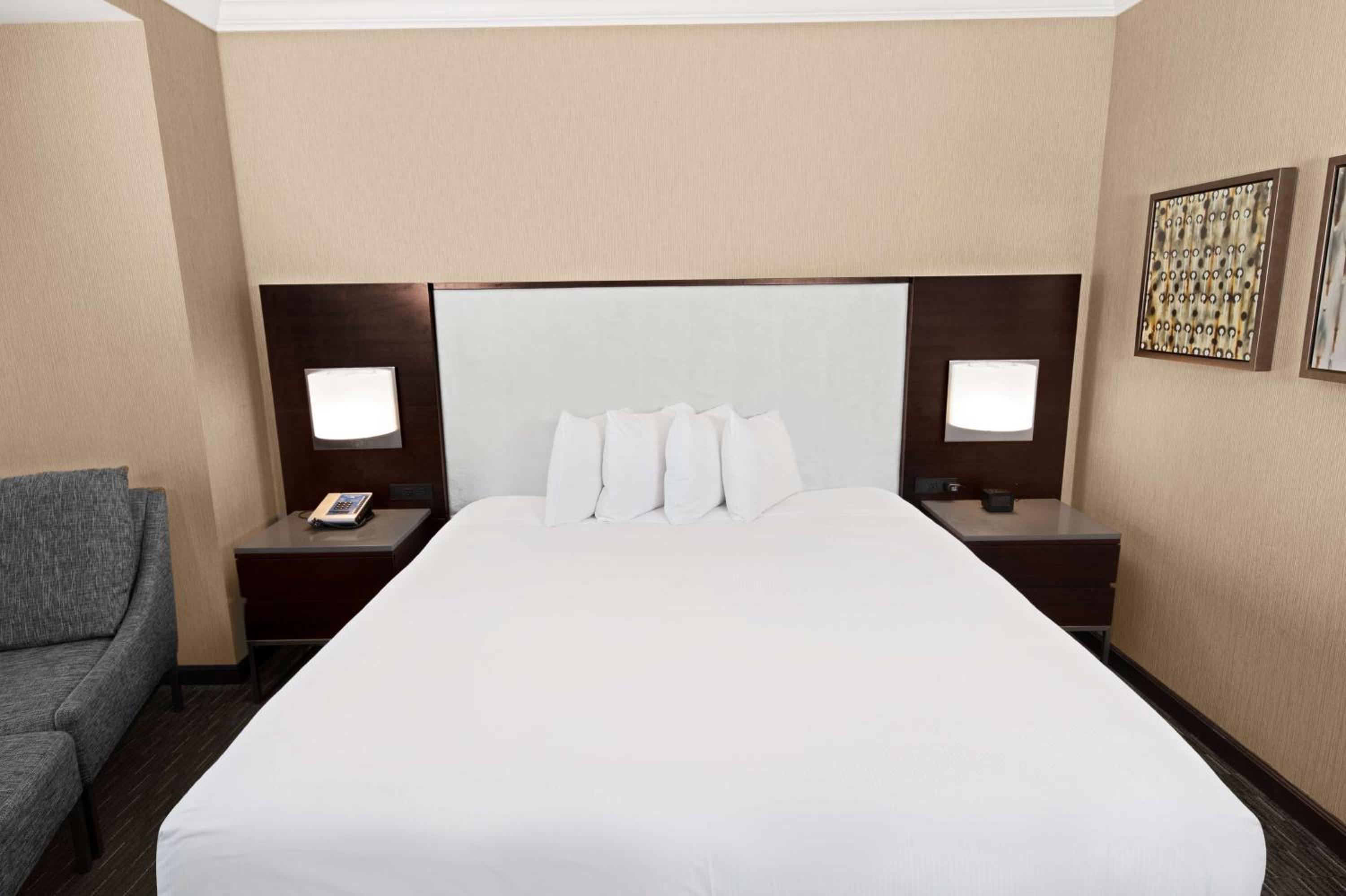 Skyline View with Balcony - One King Bed - Photo 1