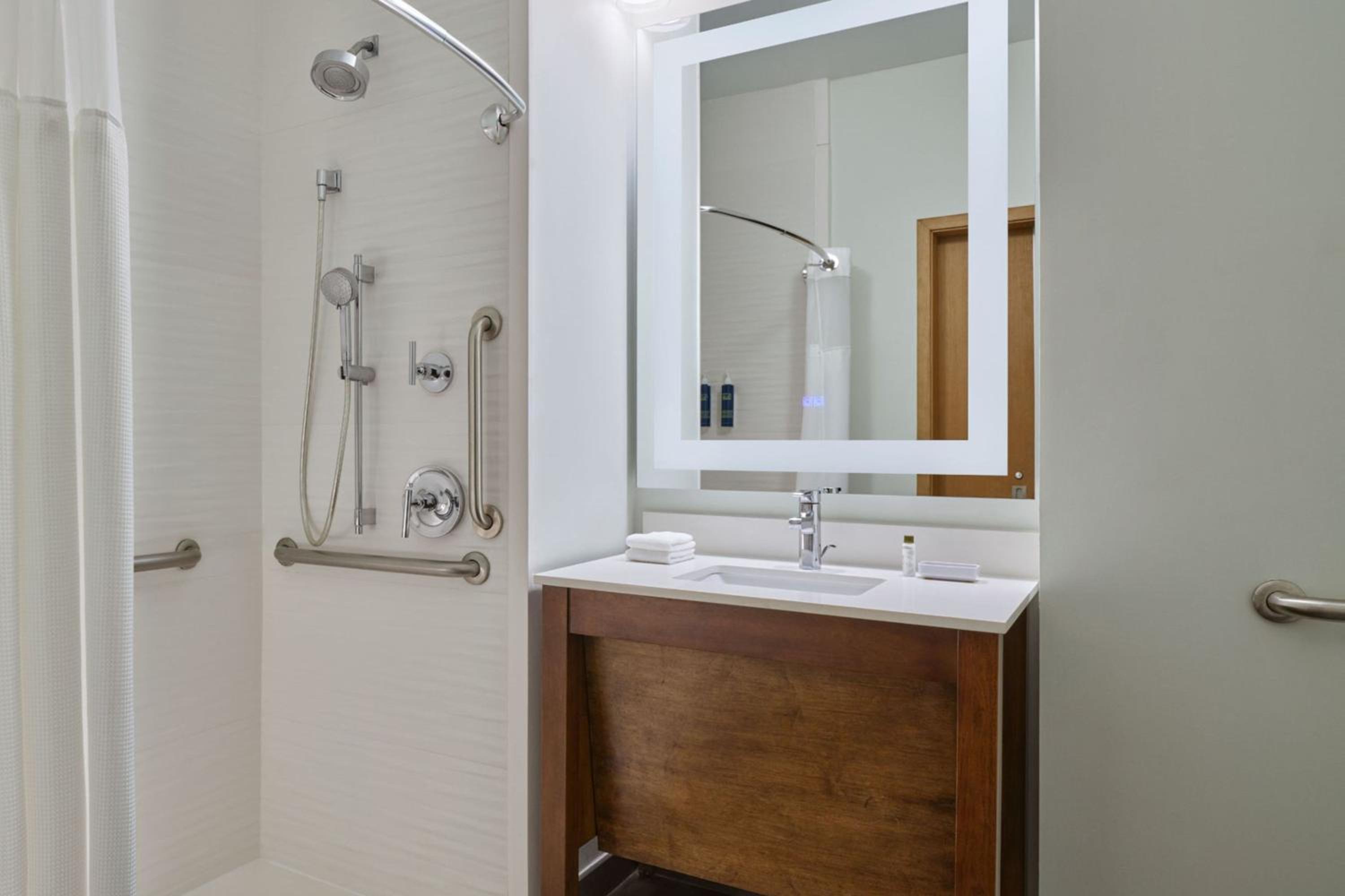 Newly Designed Junior King Suite with Roll-In Shower - Mobility Accessible