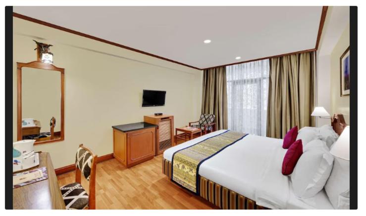 Deluxe Room - Photo 1