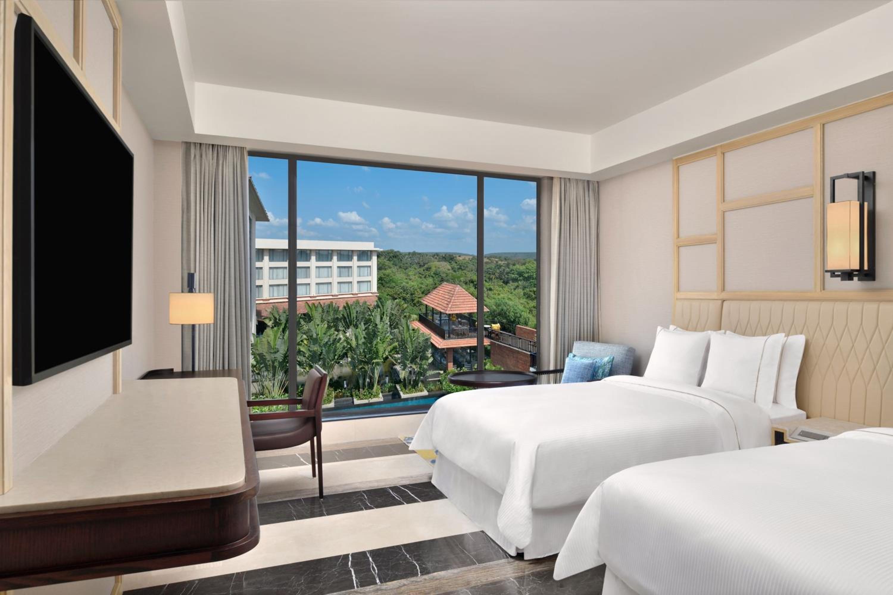 Forest View, Deluxe Guest room, 2 Double - INR 1000 SPA Credit (Stay between Sunday to Thursday) - Complimentary beer on arrival and free shuttle to the beach - Enjoy extra INR 750 credit at Drift Pool Bar once during your stay