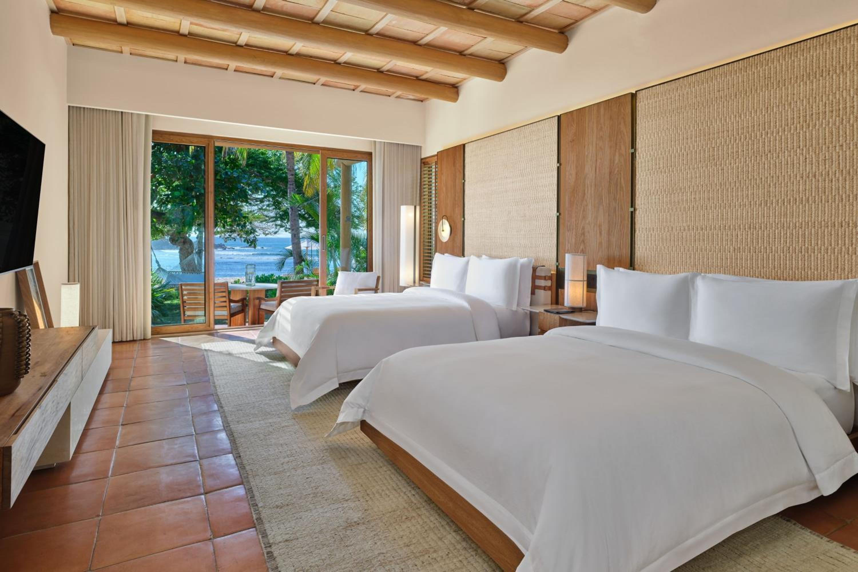 Deluxe Beachfront 2Queen, Guest room, 2 Queen, Beachfront - Photo 1