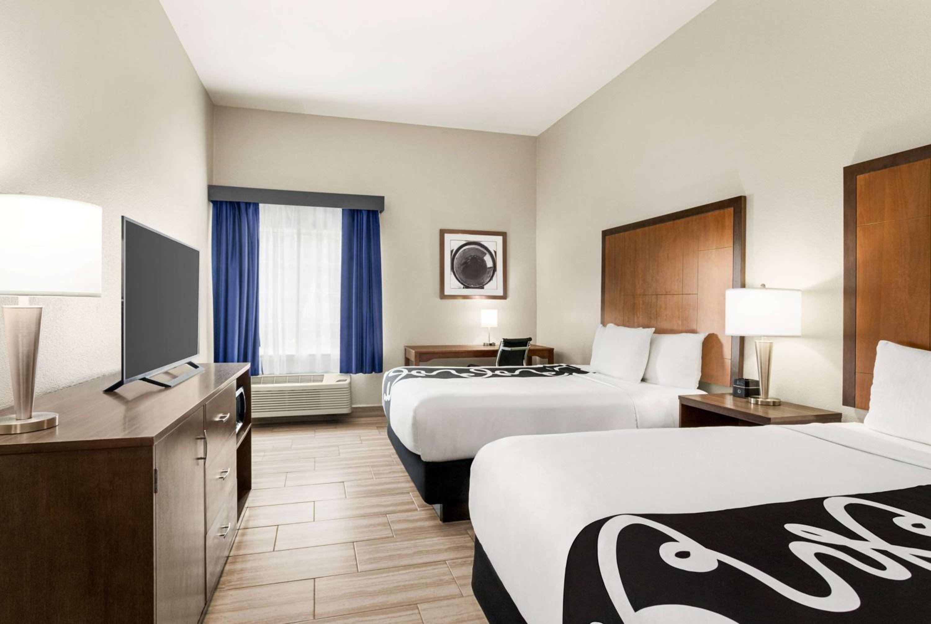 Queen Room with Two Queen Beds - Photo 1