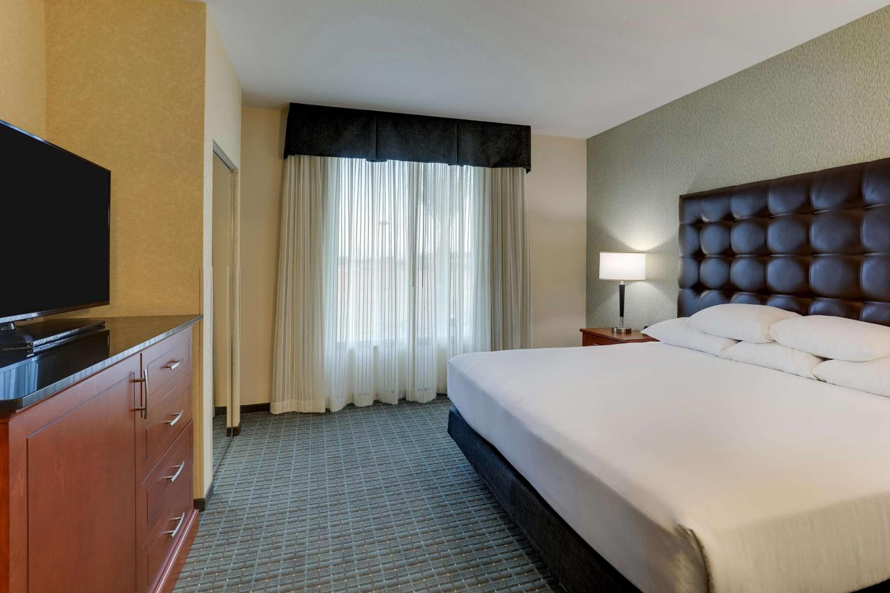 King Meeting Suite with Board Room Table, 2 Rooms -  Hearing Accessible , Roll-in Shower photo 1