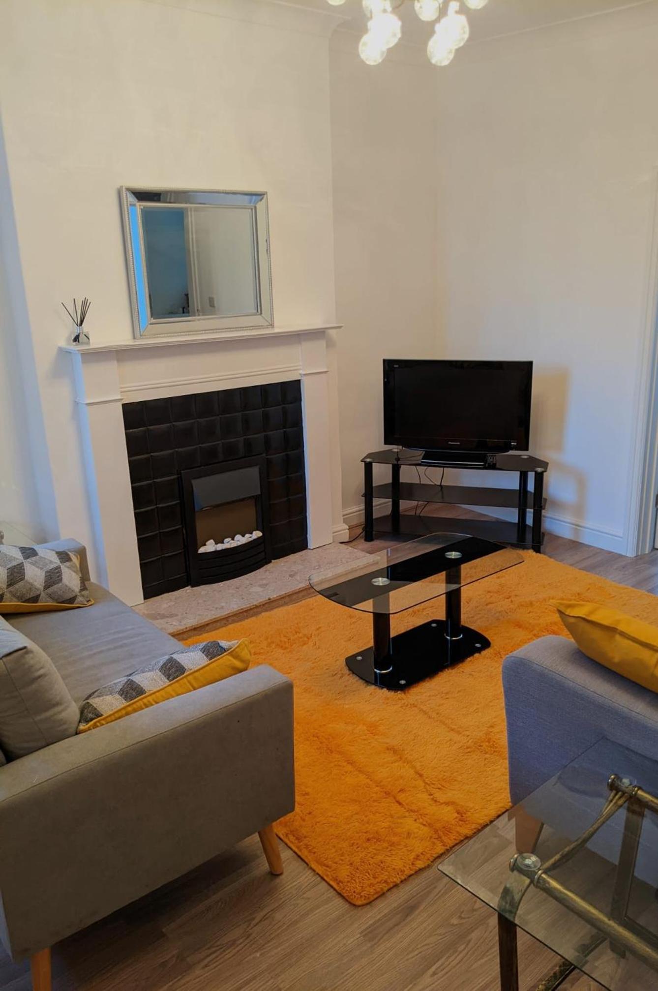 Three-Bedroom Apartment photo 1