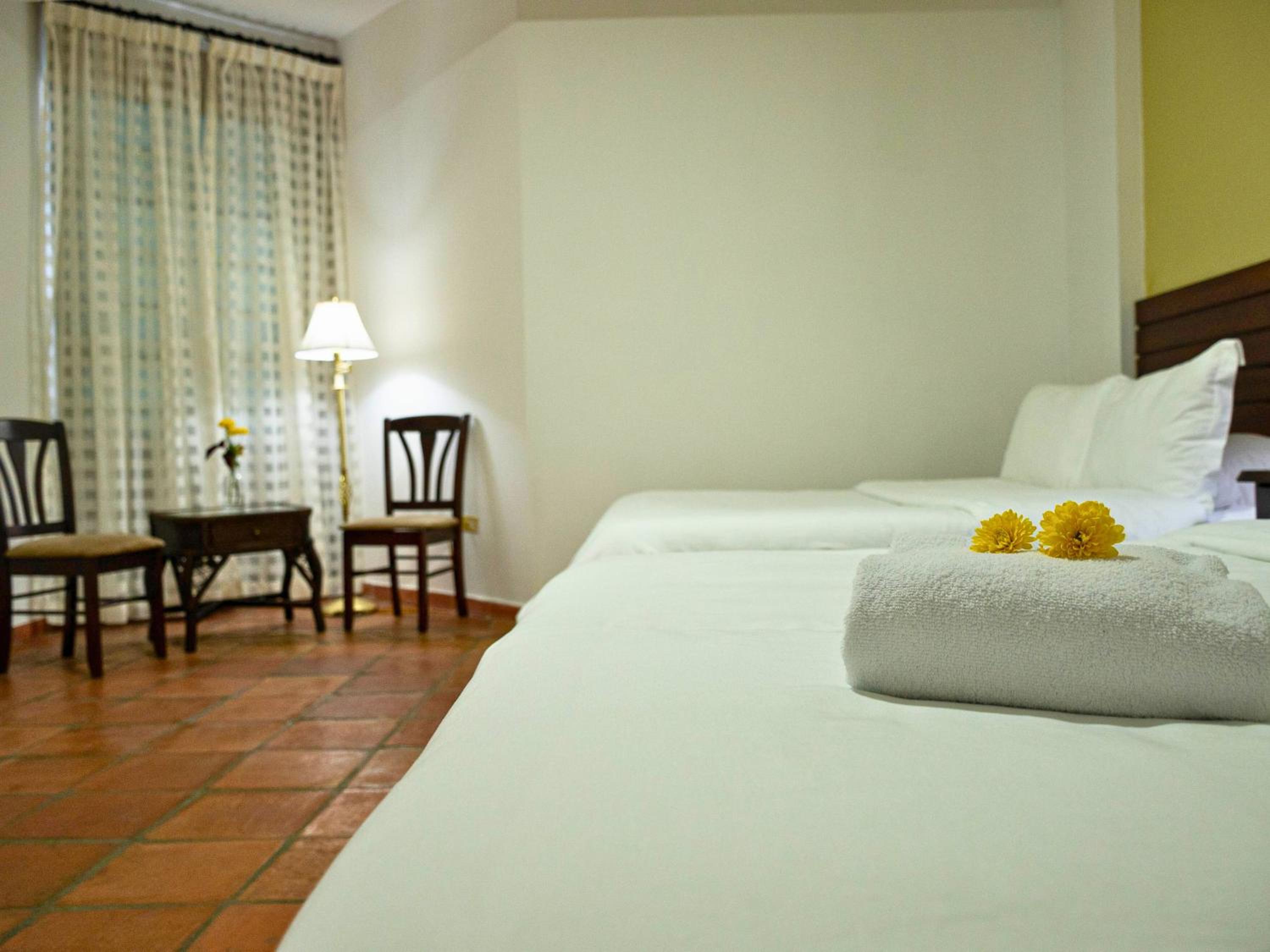 Standard Queen Room With Two Queen Beds photo 3
