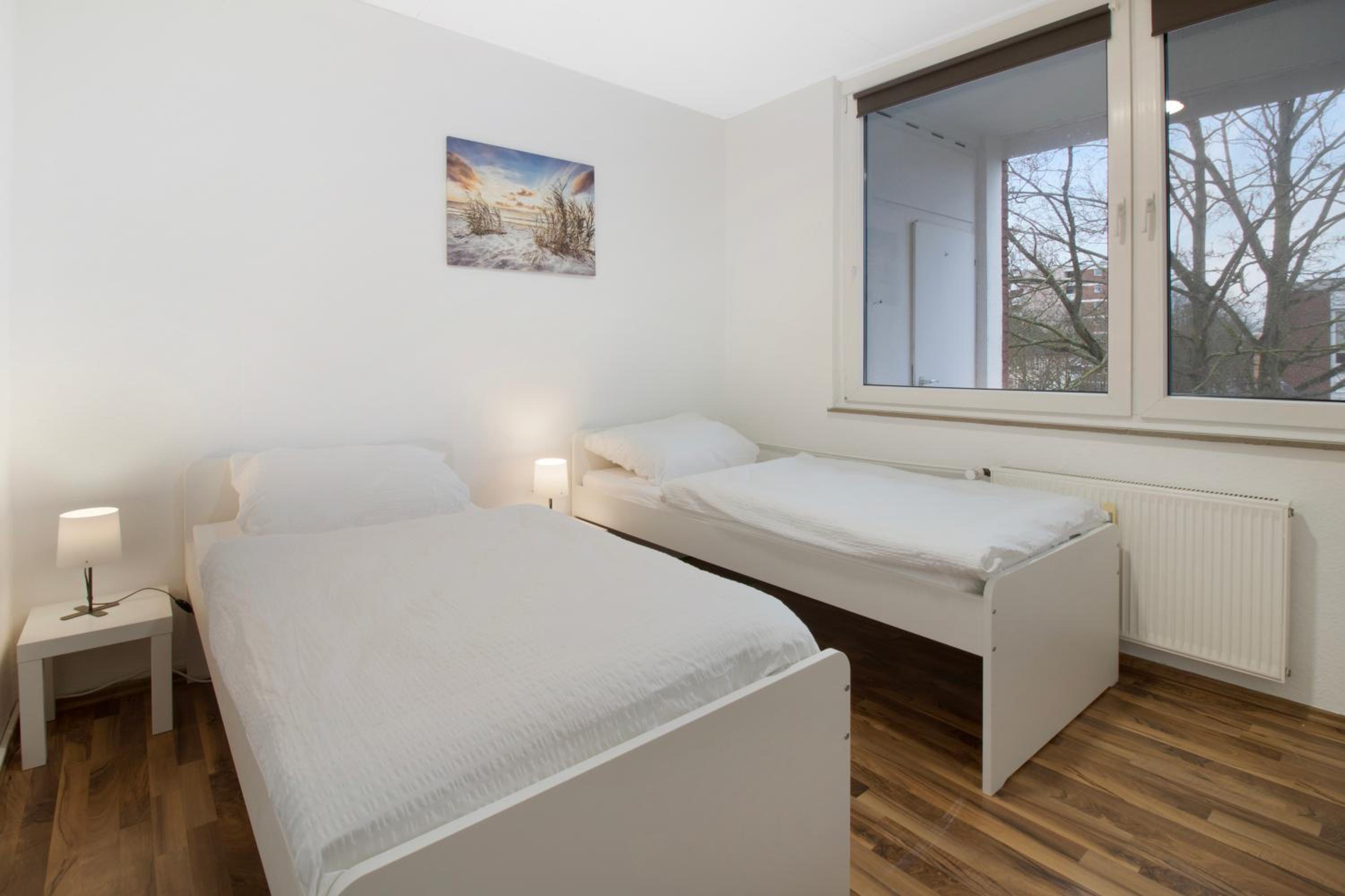Three-Bedroom Apartment photo 1
