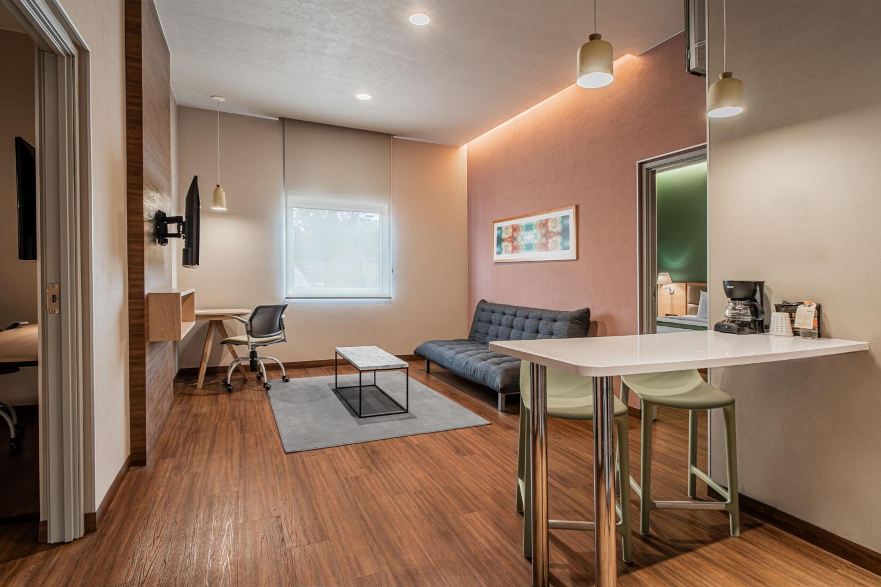 Two-Bedroom Suite with One King and Two Double Beds with Sofa Bed and Kitchenette - Photo 1
