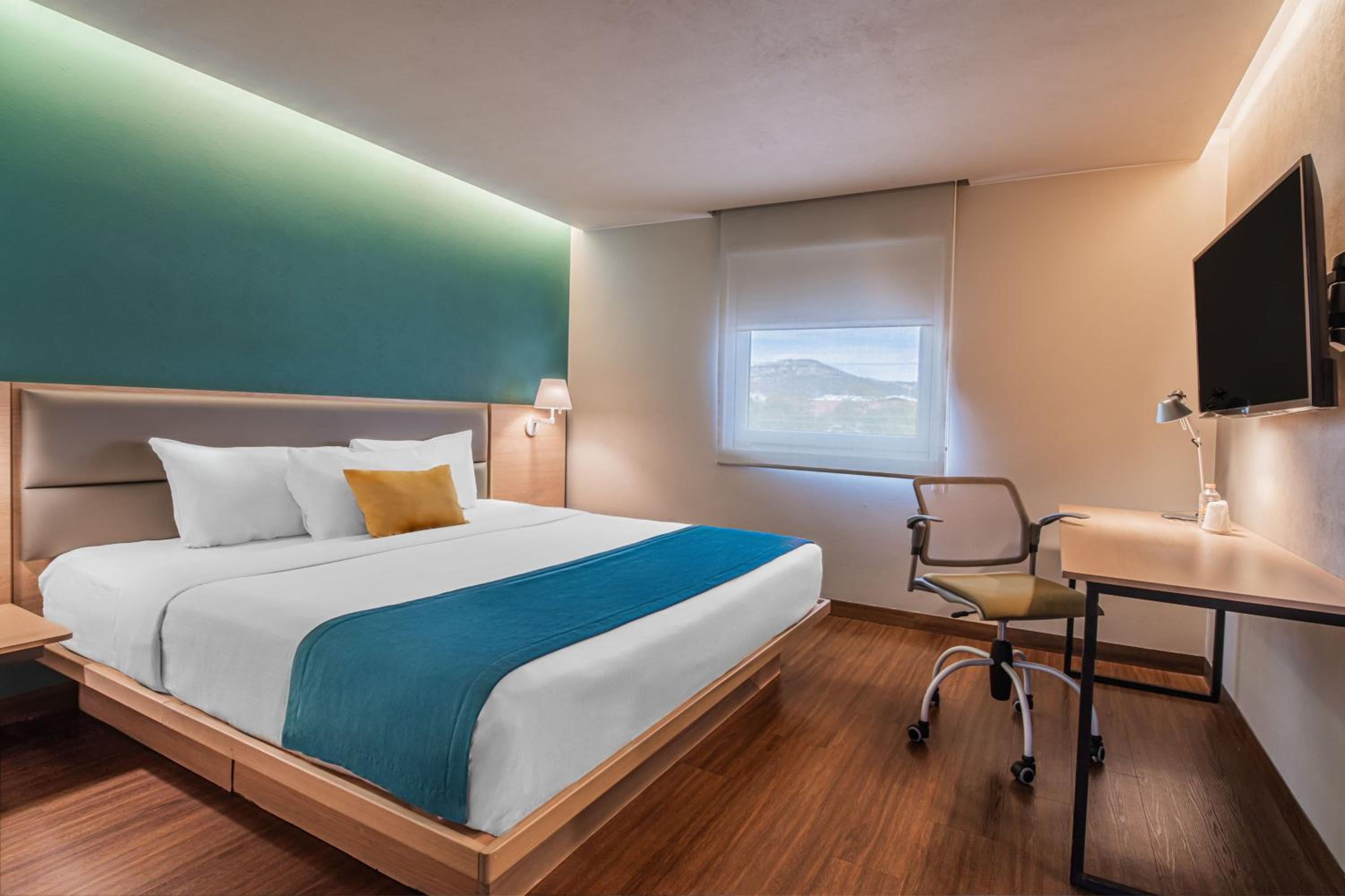 Two-Bedroom Suite with One King and Two Double Beds with Sofa Bed and Kitchenette - Photo 2