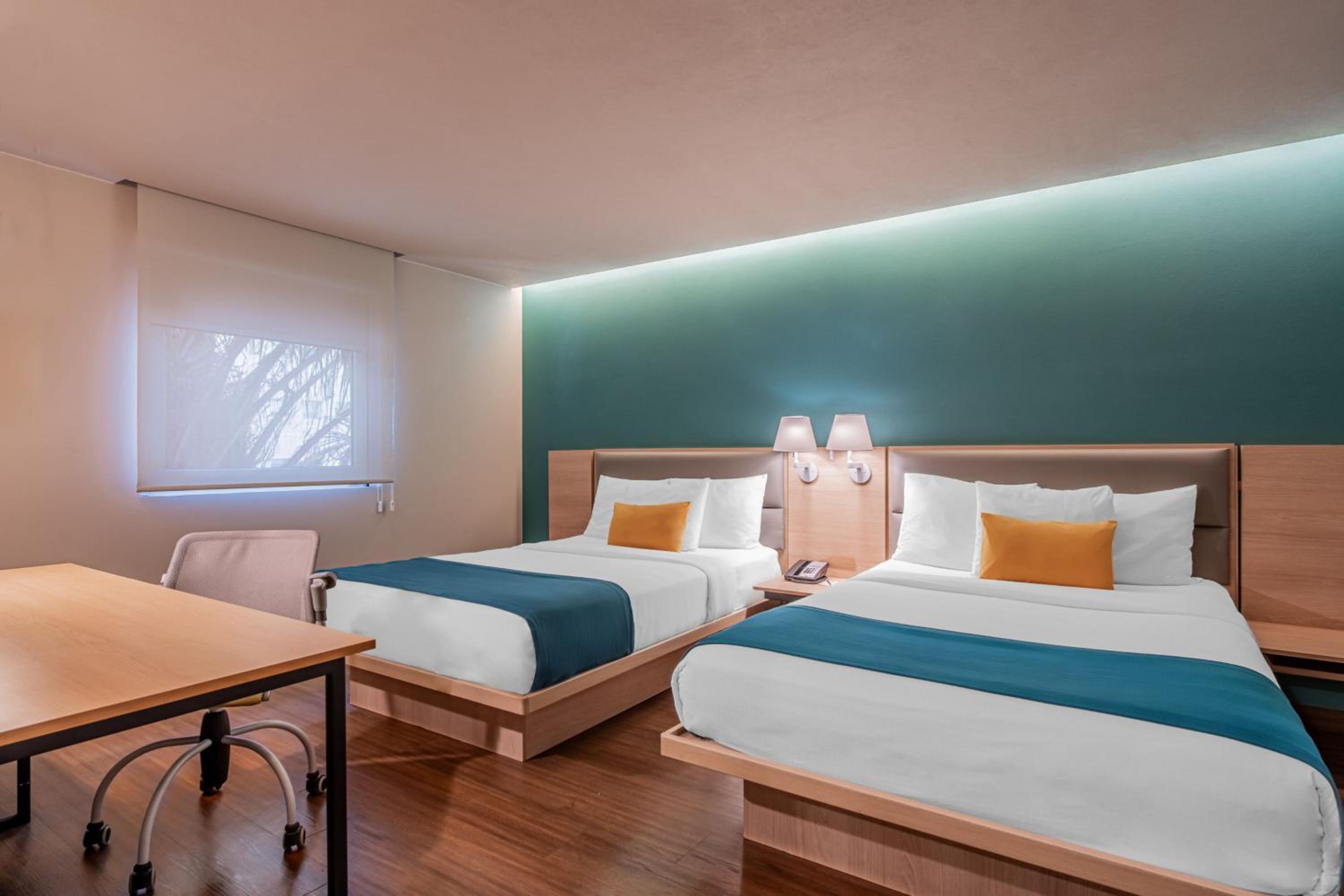 Junior Double Suite with Two Double Beds and Sofa Bed - Photo 1