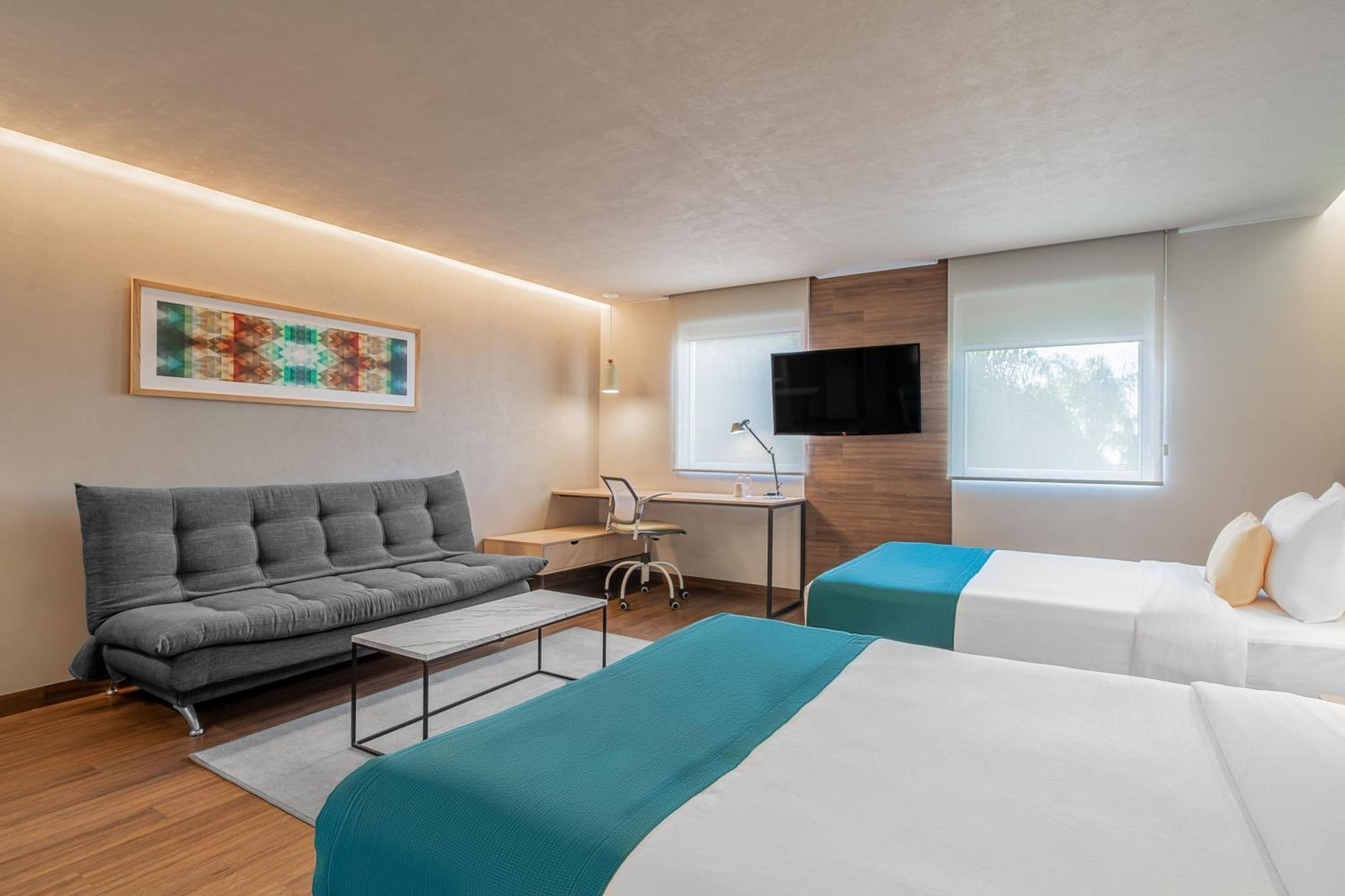 Double Suite with Two Double Beds and Sofa Bed - Photo 1