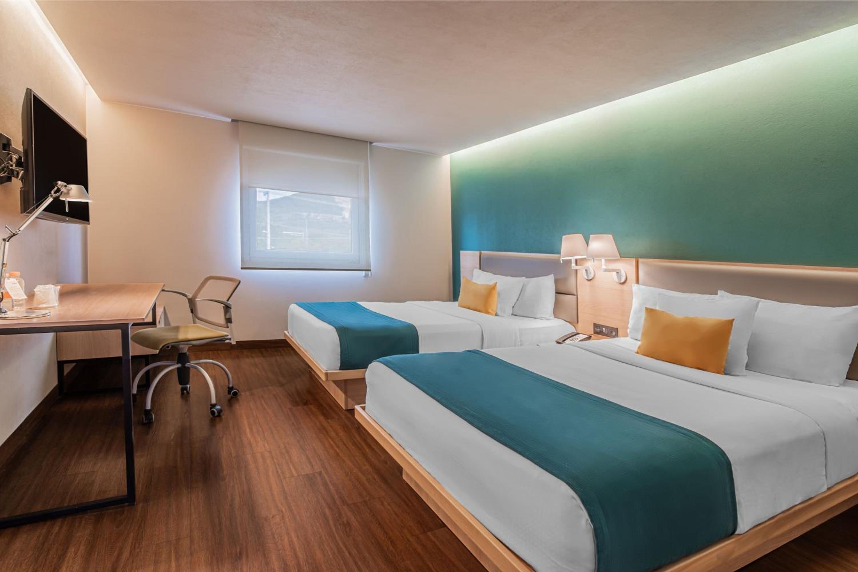 Two-Bedroom Suite with One King and Two Double Beds with Sofa Bed and Kitchenette - Photo 8