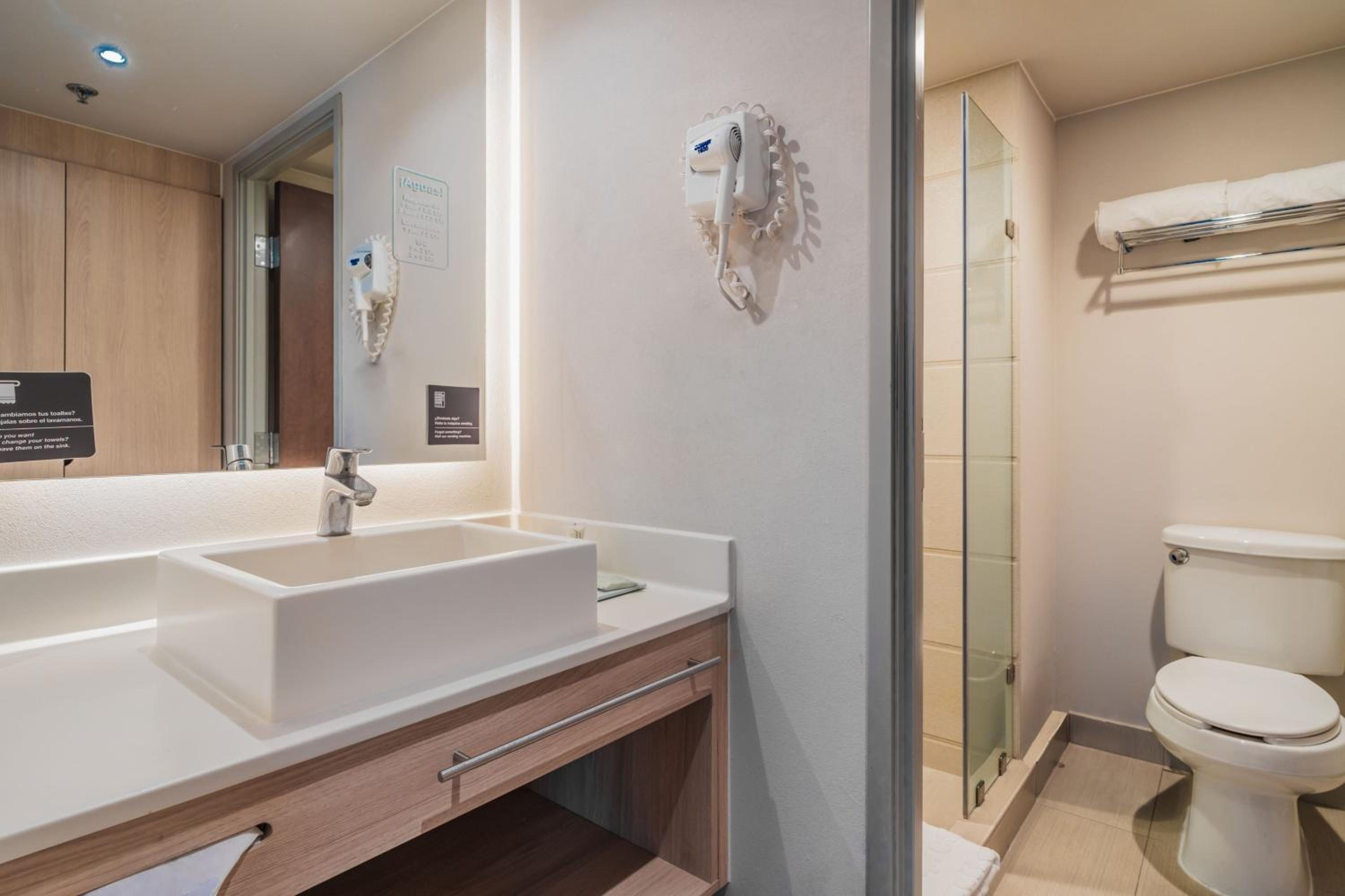 Two-Bedroom Suite with One King and Two Double Beds with Sofa Bed and Kitchenette - Photo 11
