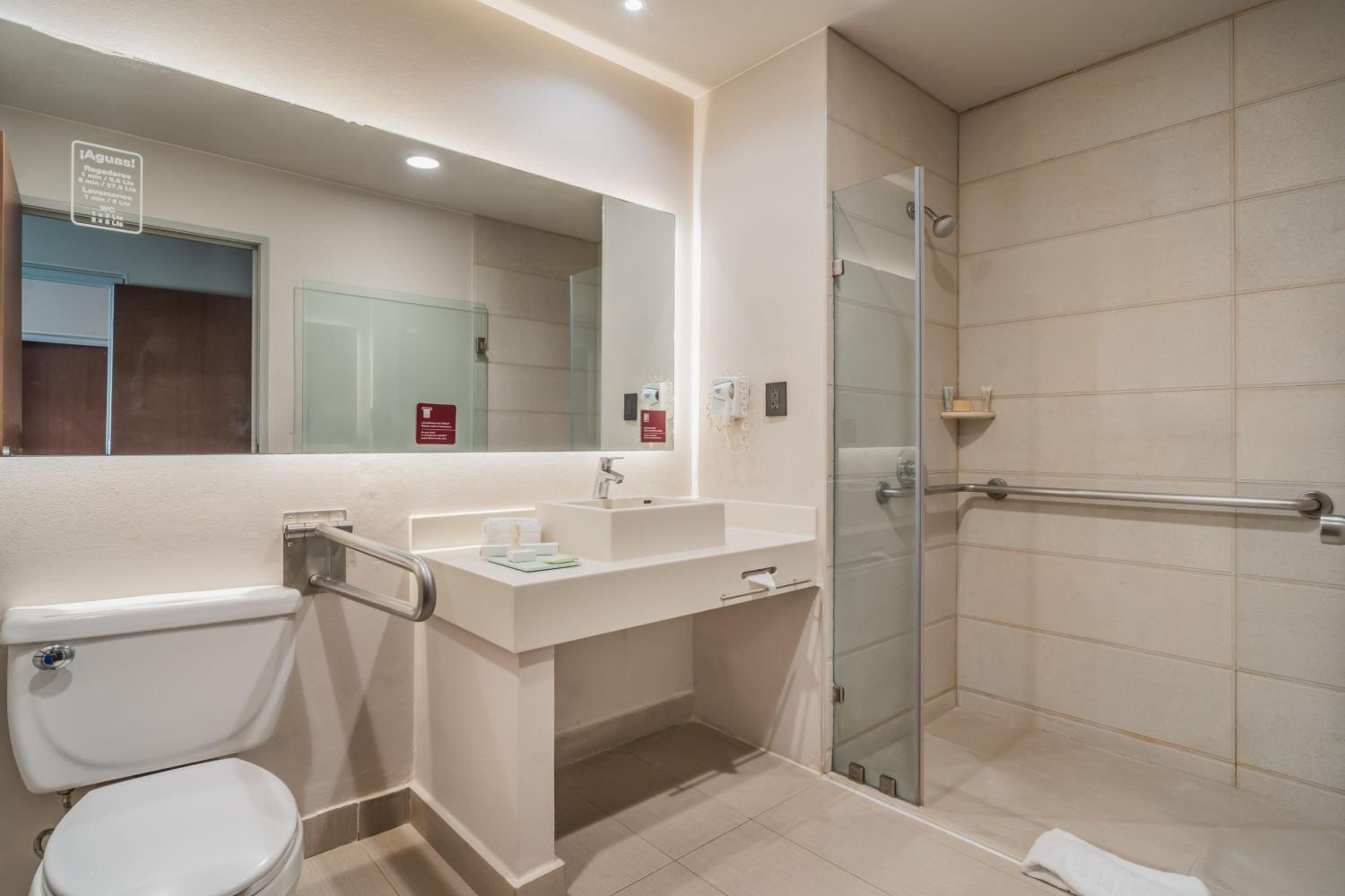 Two-Bedroom Suite with One King and Two Double Beds with Sofa Bed and Kitchenette - Photo 10