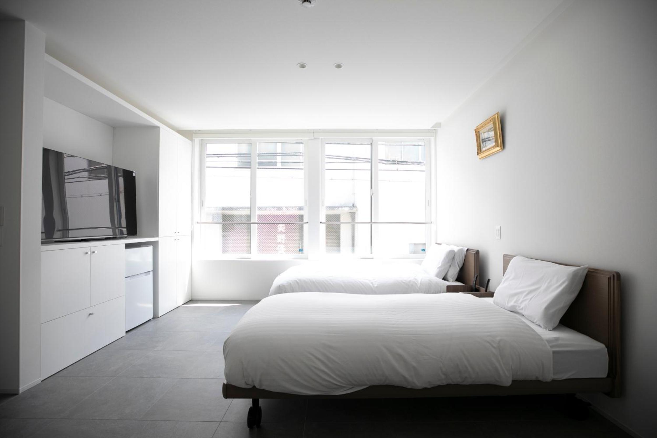 Twin Room with Private Bathroom - Photo 16