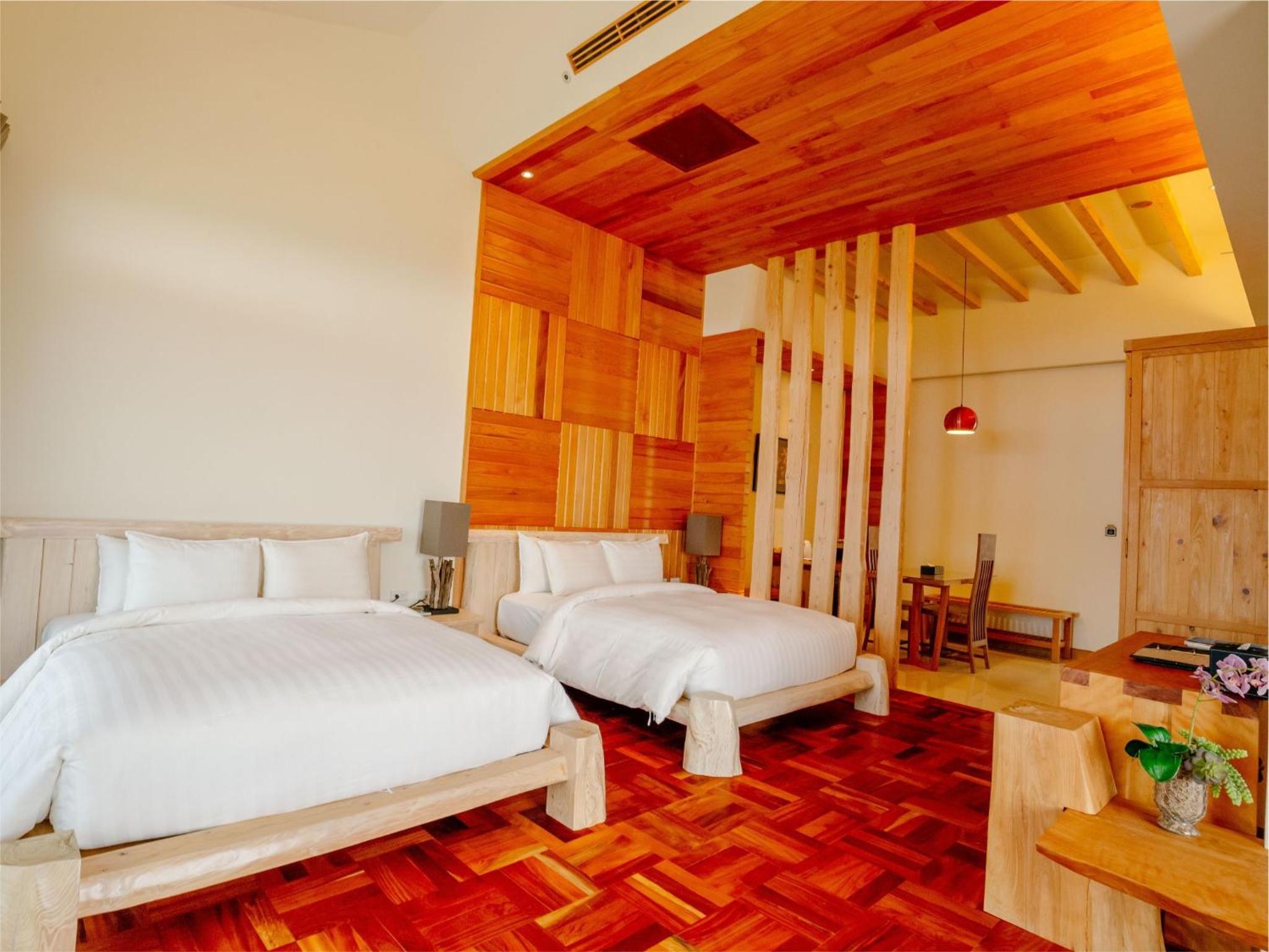 Deluxe Quadruple Room - Photo 9