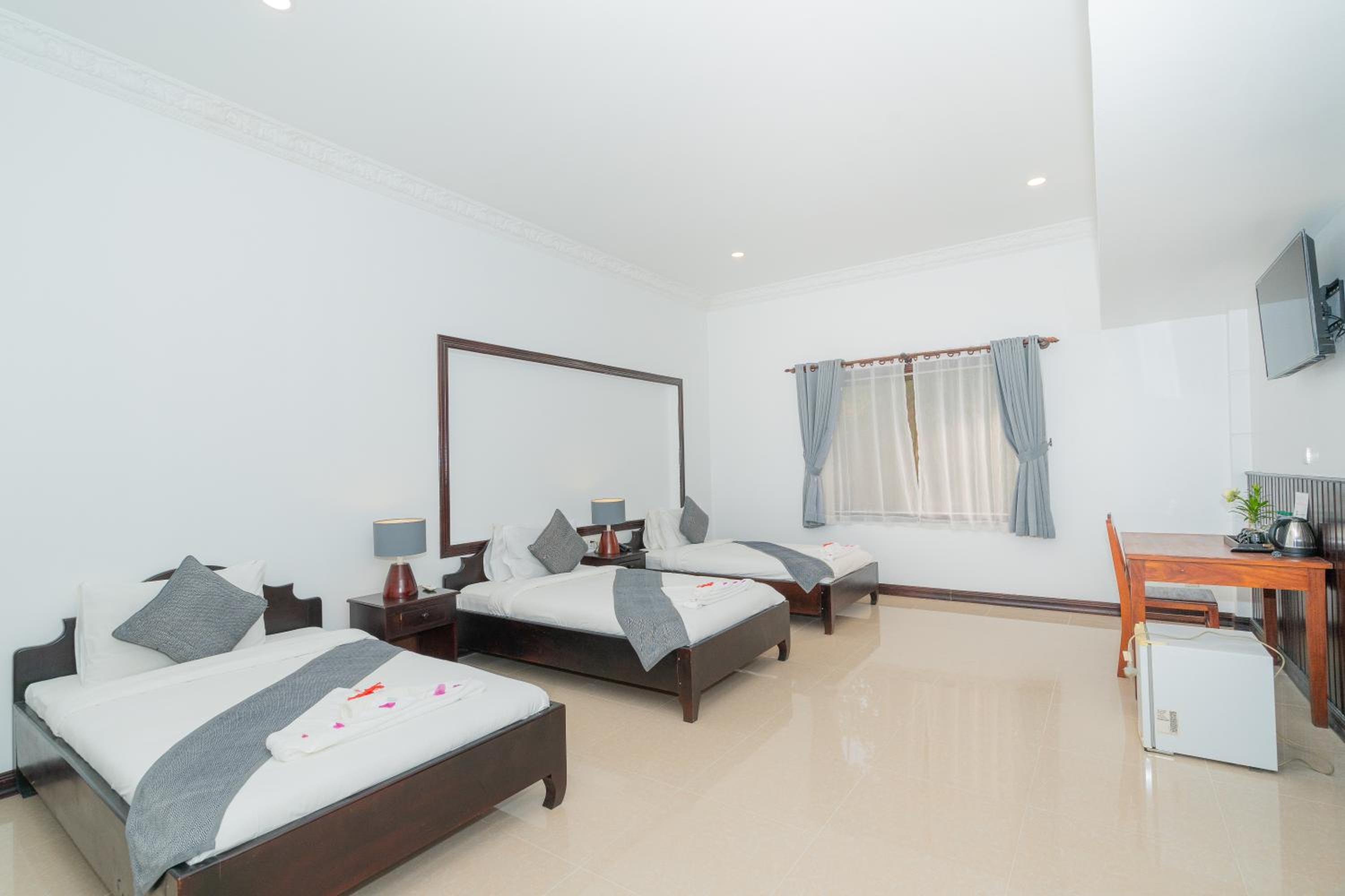 Deluxe Triple Room - Photo 1