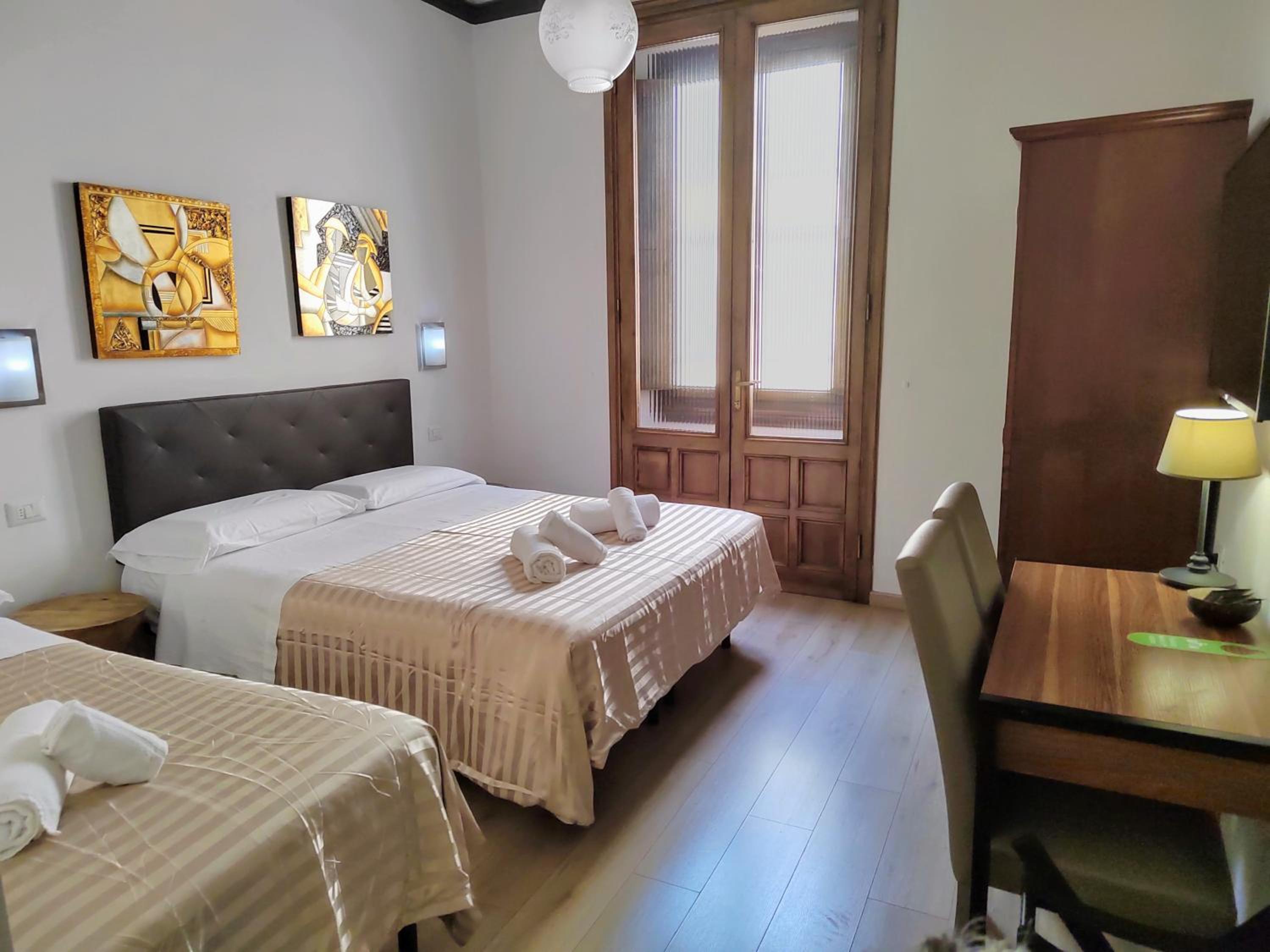 Double Room with extra bed with private bathroom photo 1
