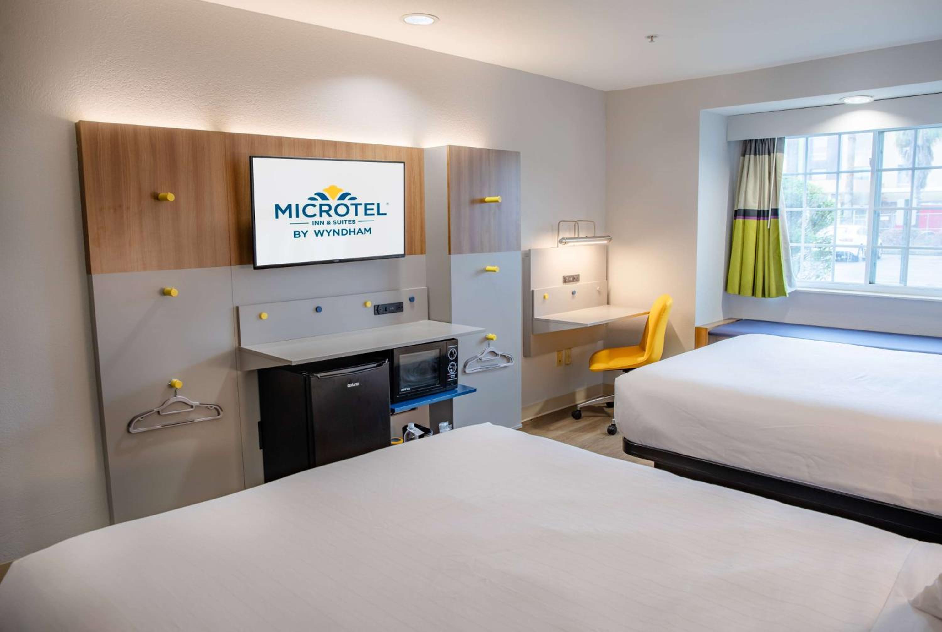Deluxe Queen Room with Two Queen Beds - Photo 1