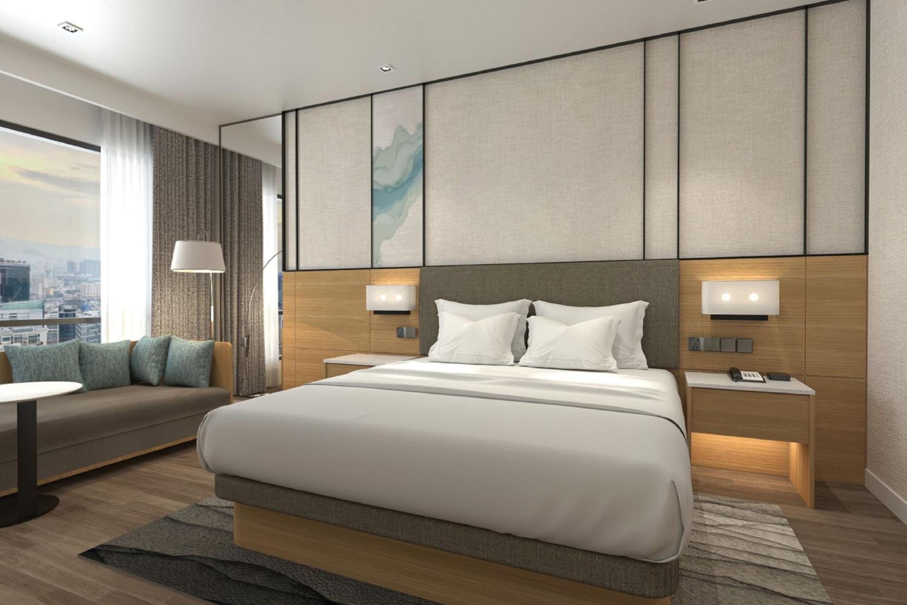 Deluxe Corner King Room with City View photo 1