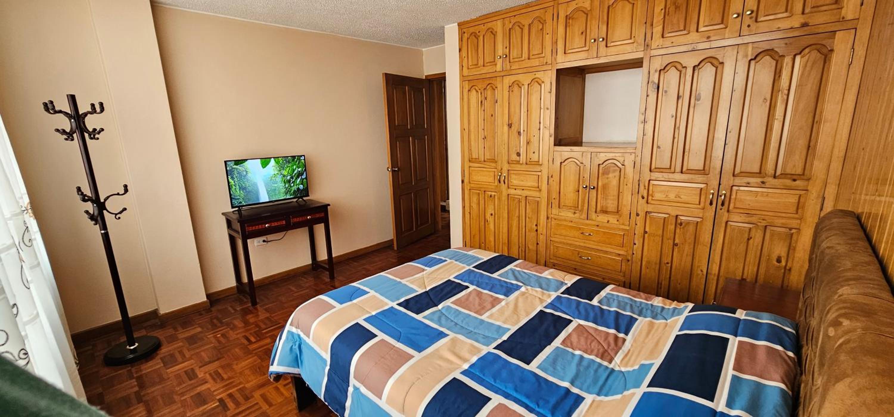 Three-Bedroom Apartment photo 1
