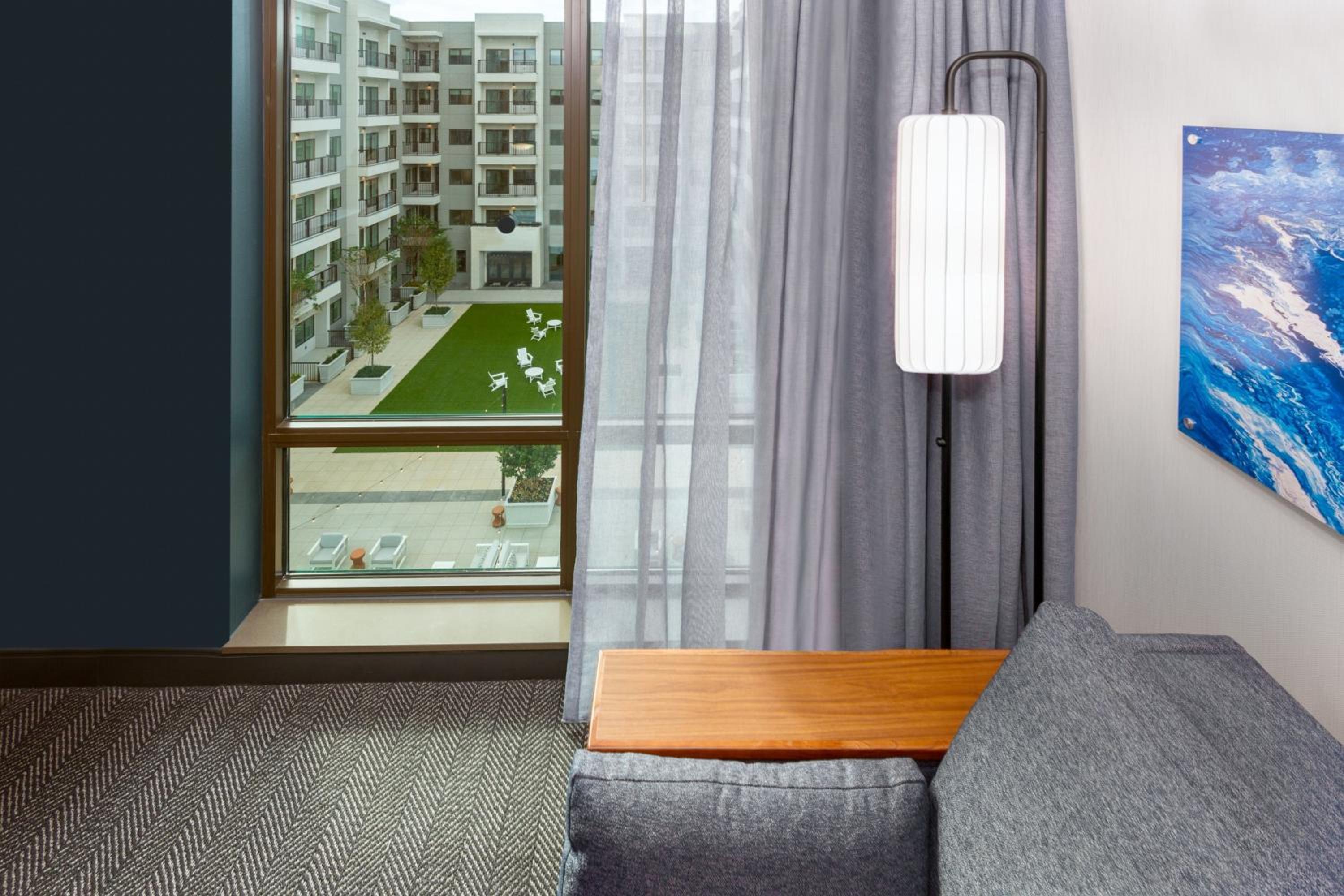 King Room with Sofa Bed and Courtyard View
