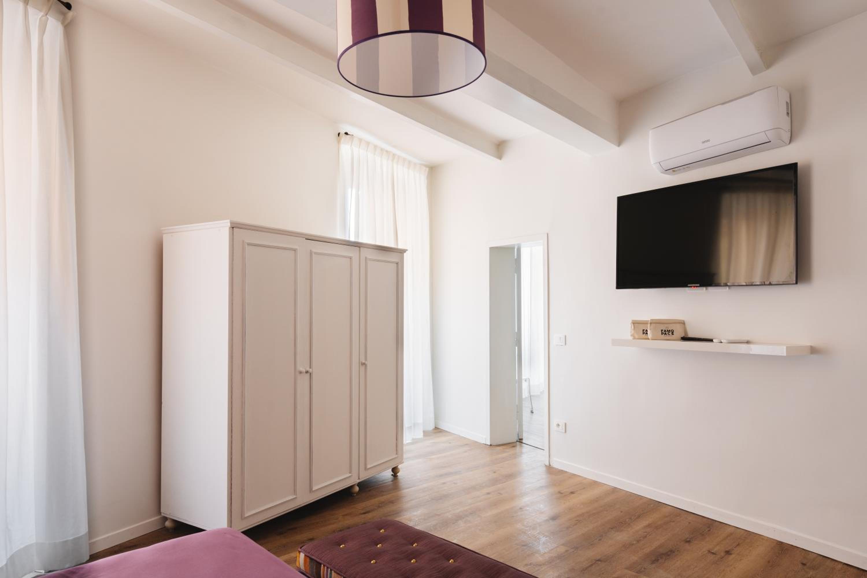 Quadruple Room with Private Bathroom