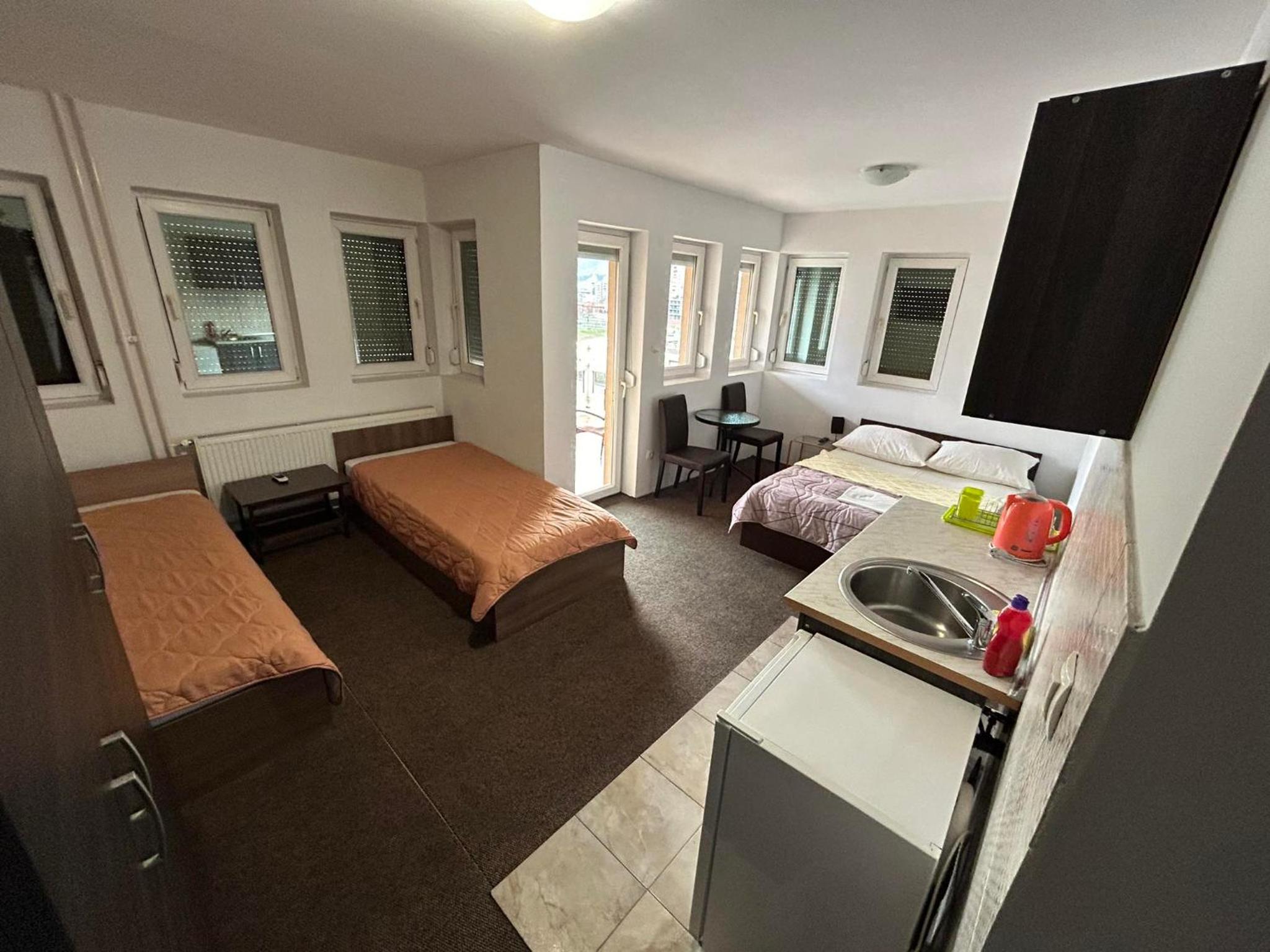 One-Bedroom Apartment with Balcony and City View