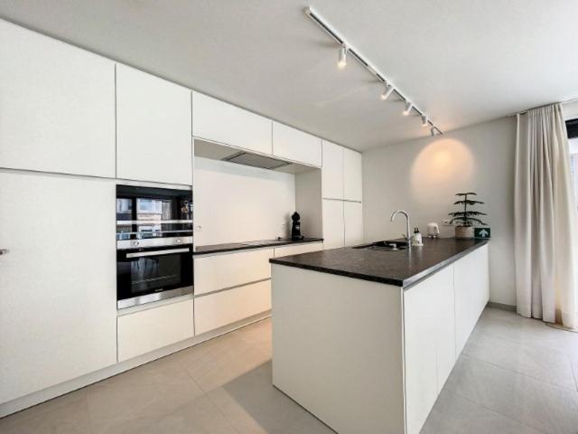 Three-Bedroom Apartment photo 2