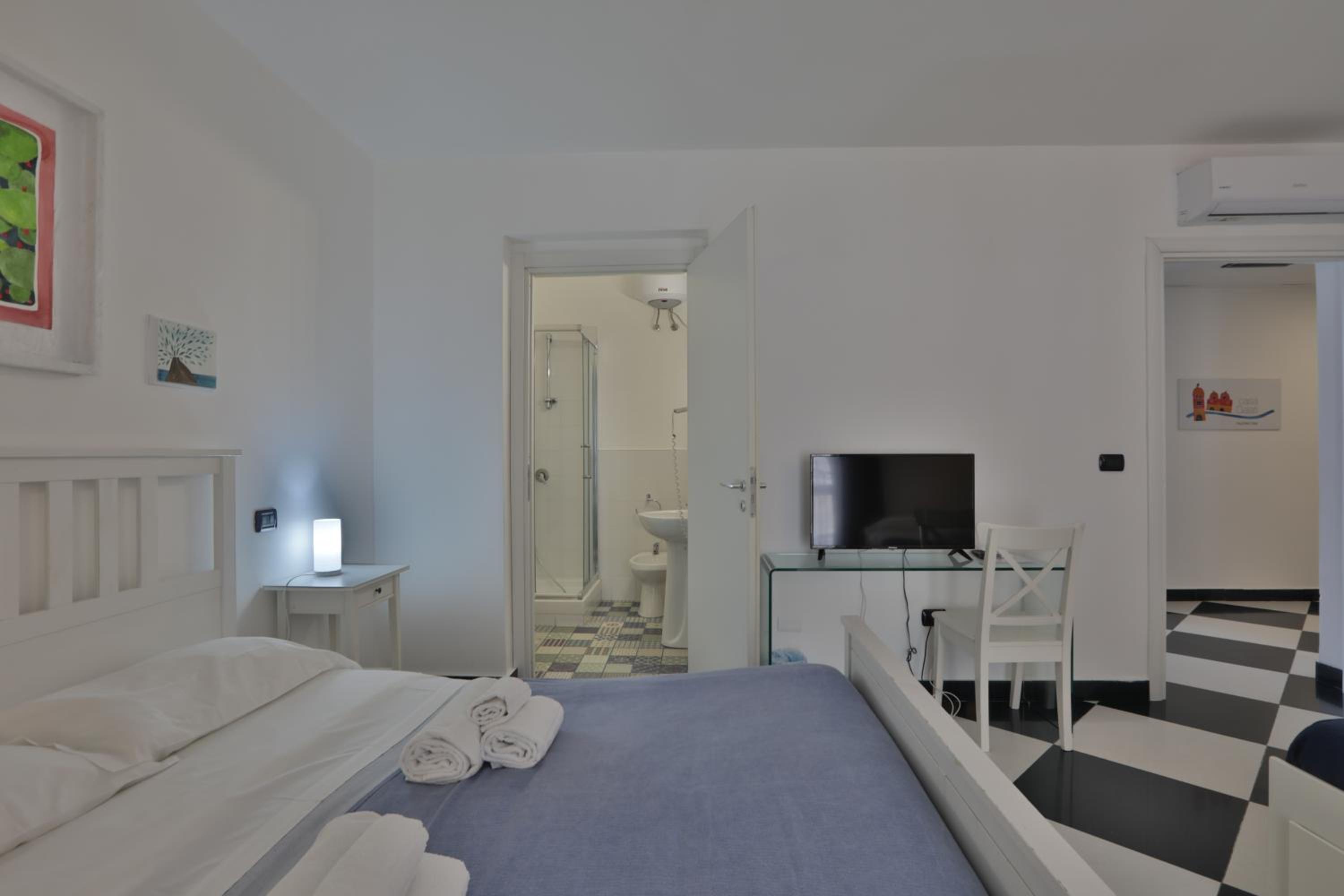 Camera Quadrupla con balcone con bagno privato