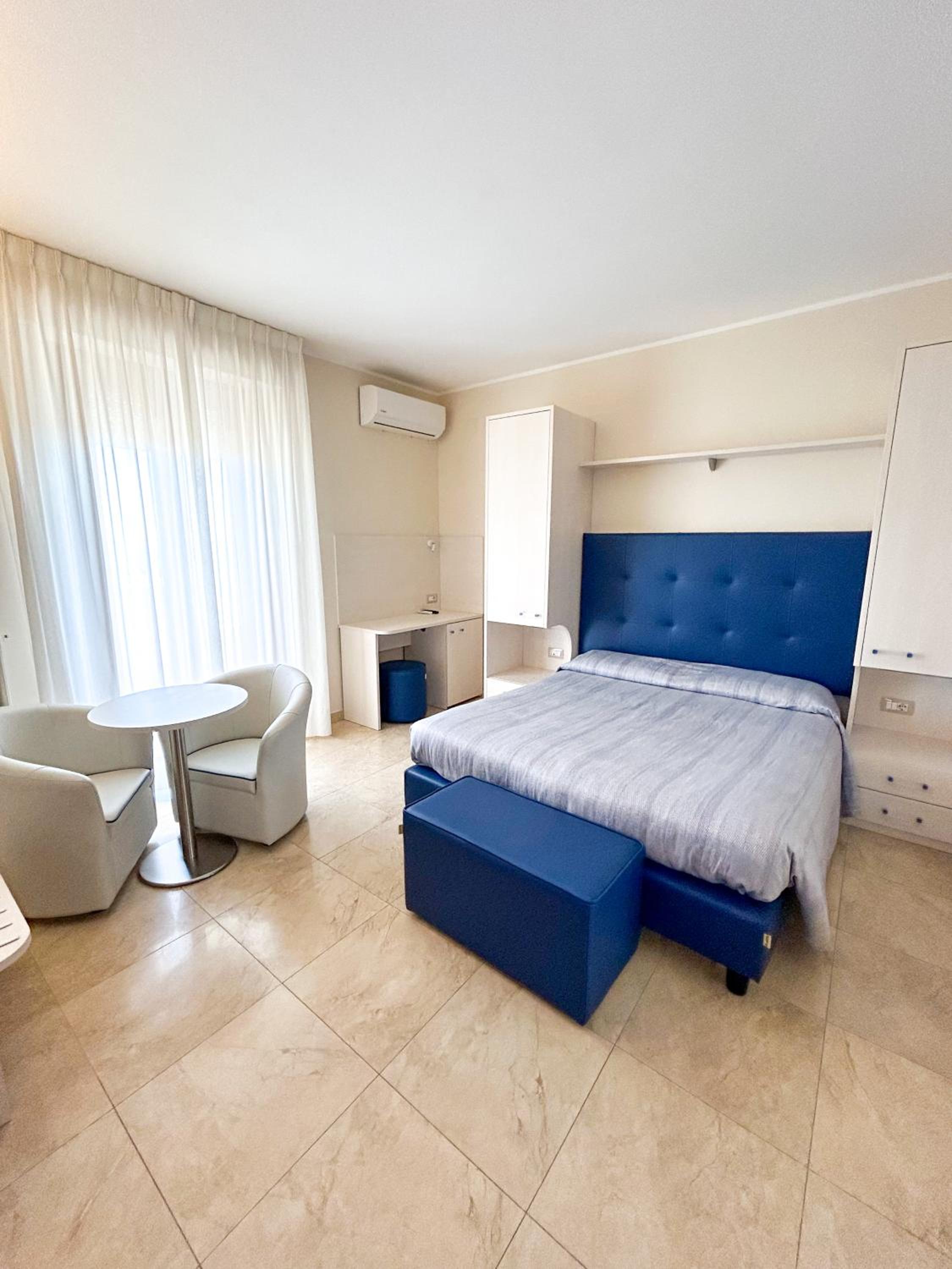 Deluxe Room - Photo 1