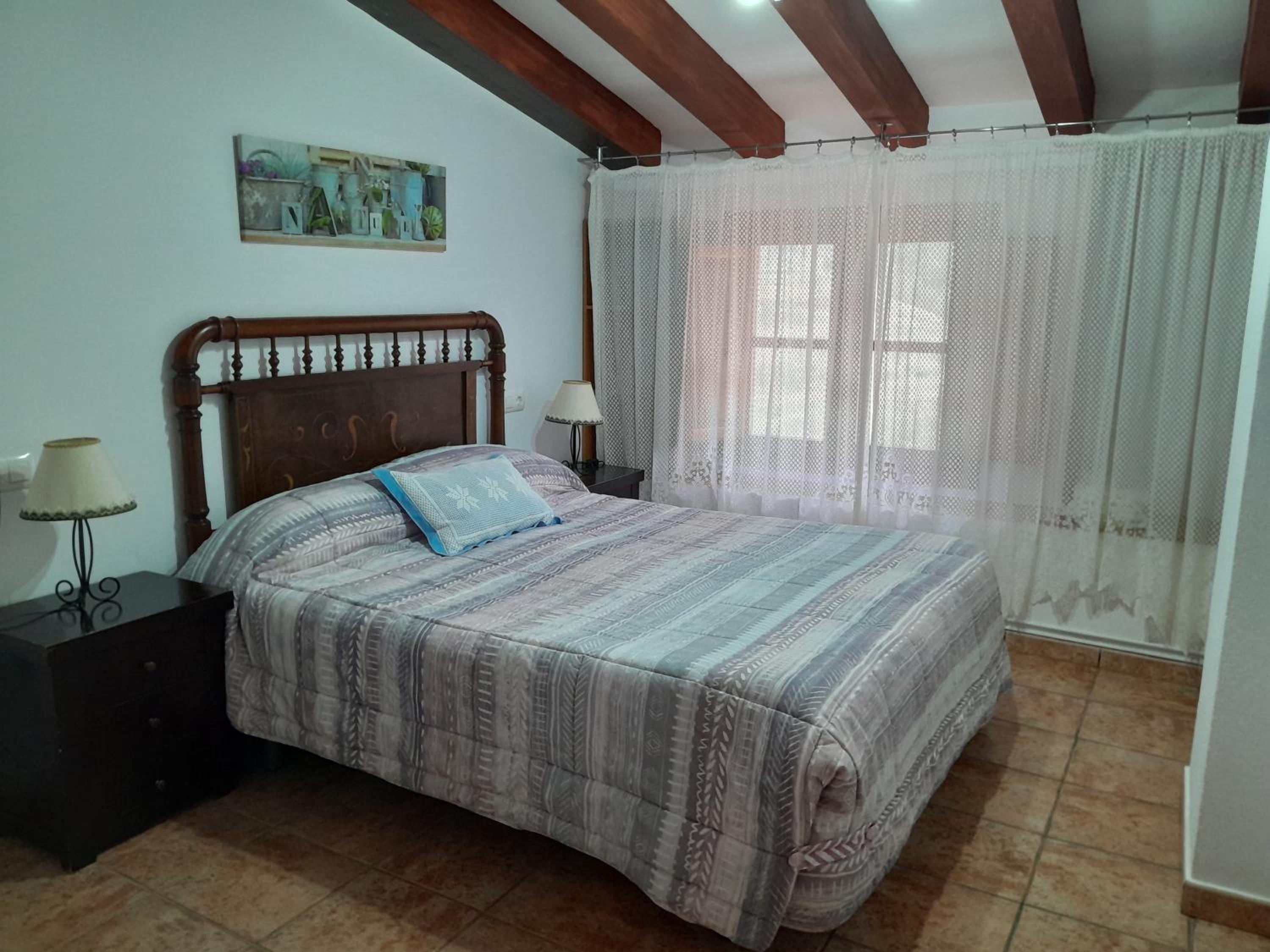 Casa adosada de tres habitaciones