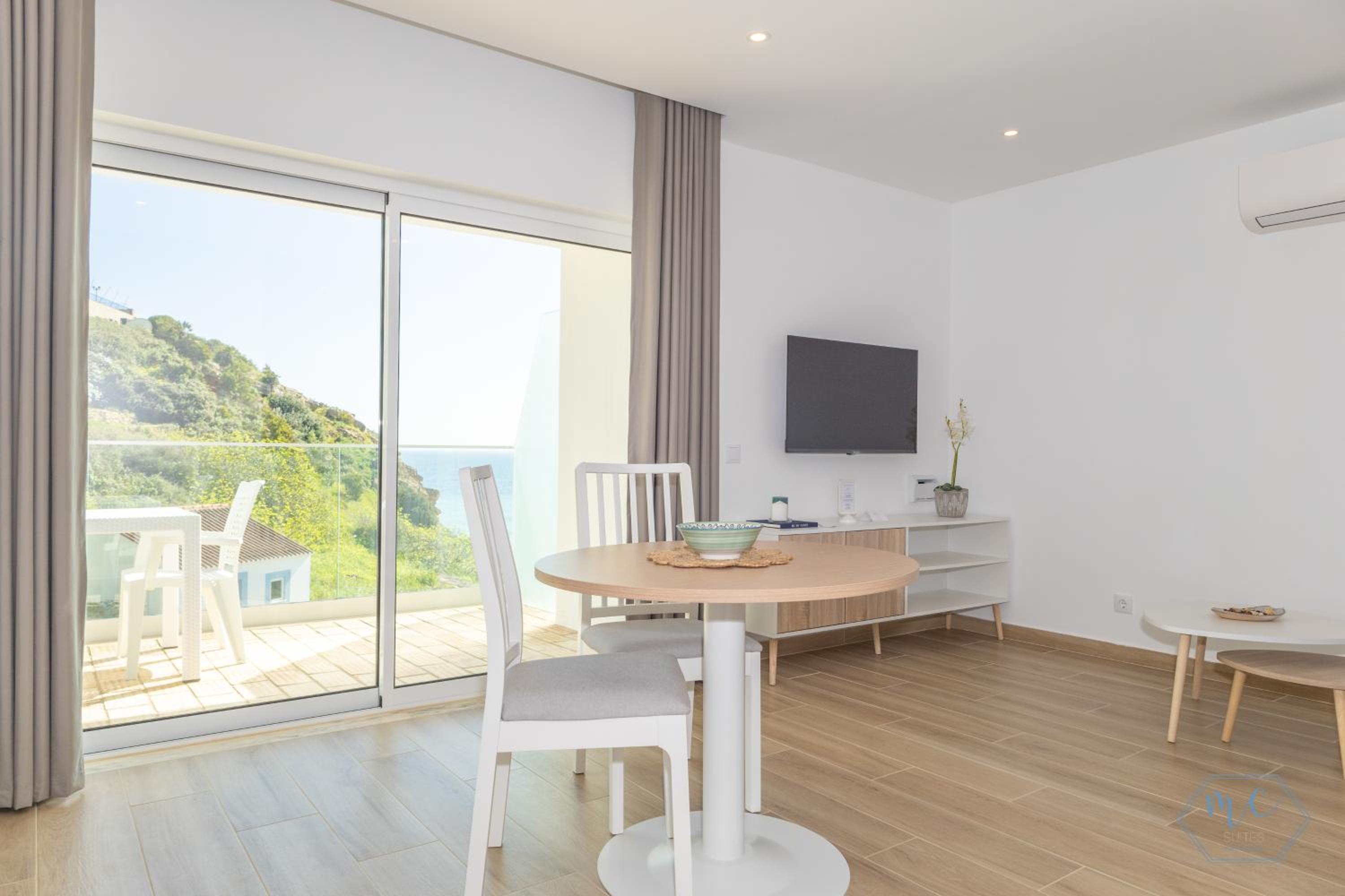 One-Bedroom Apartment with Balcony and Sea View